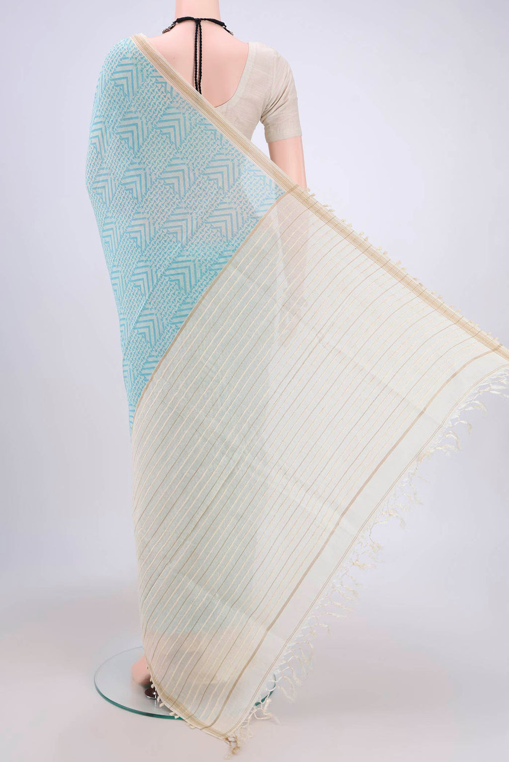 Flat view of Blue Tussar Saree with Floral Print on the body and Plain Border. 