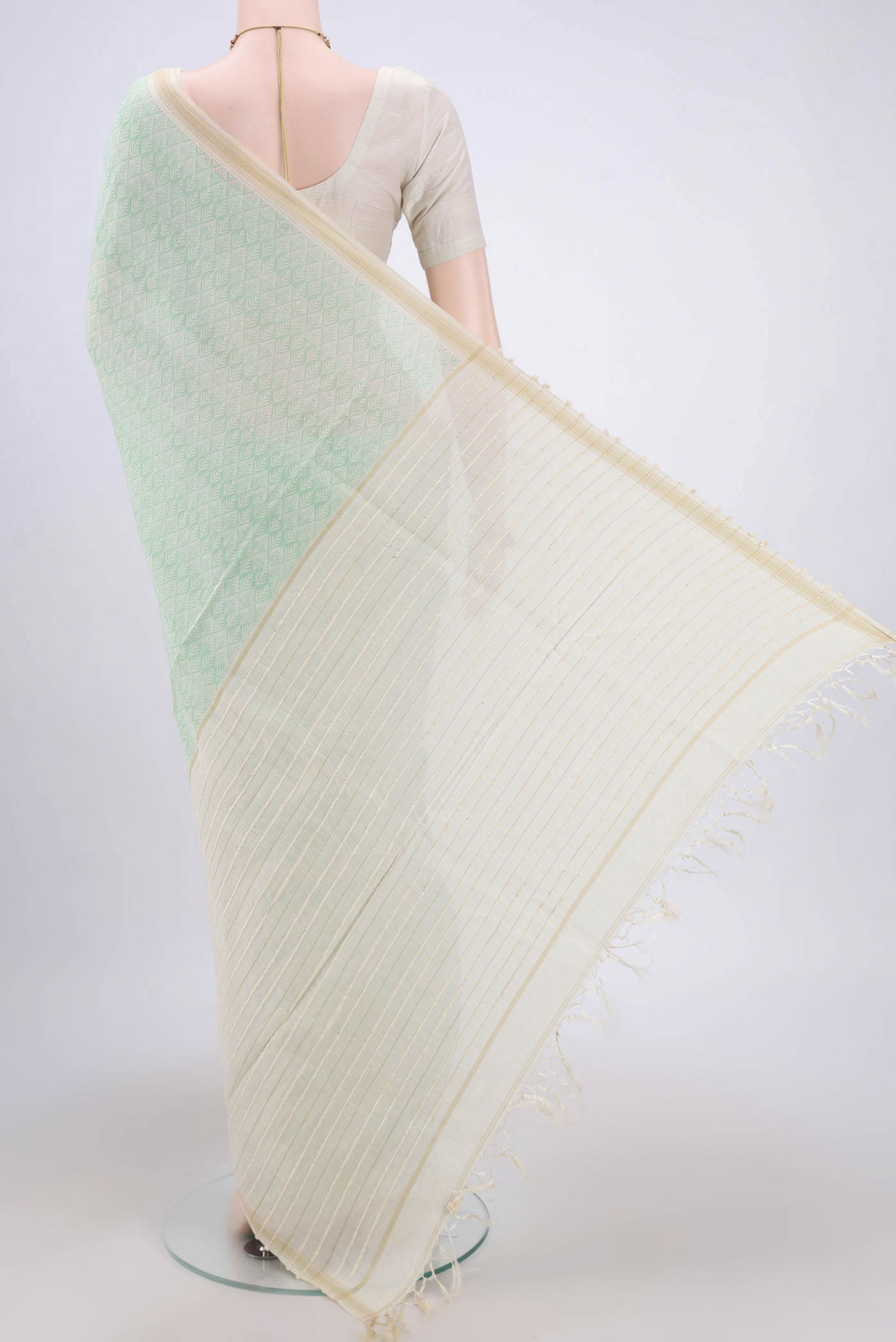 Flat view of Sea Green Tussar Saree with Floral Print on the body and Plain Border. 