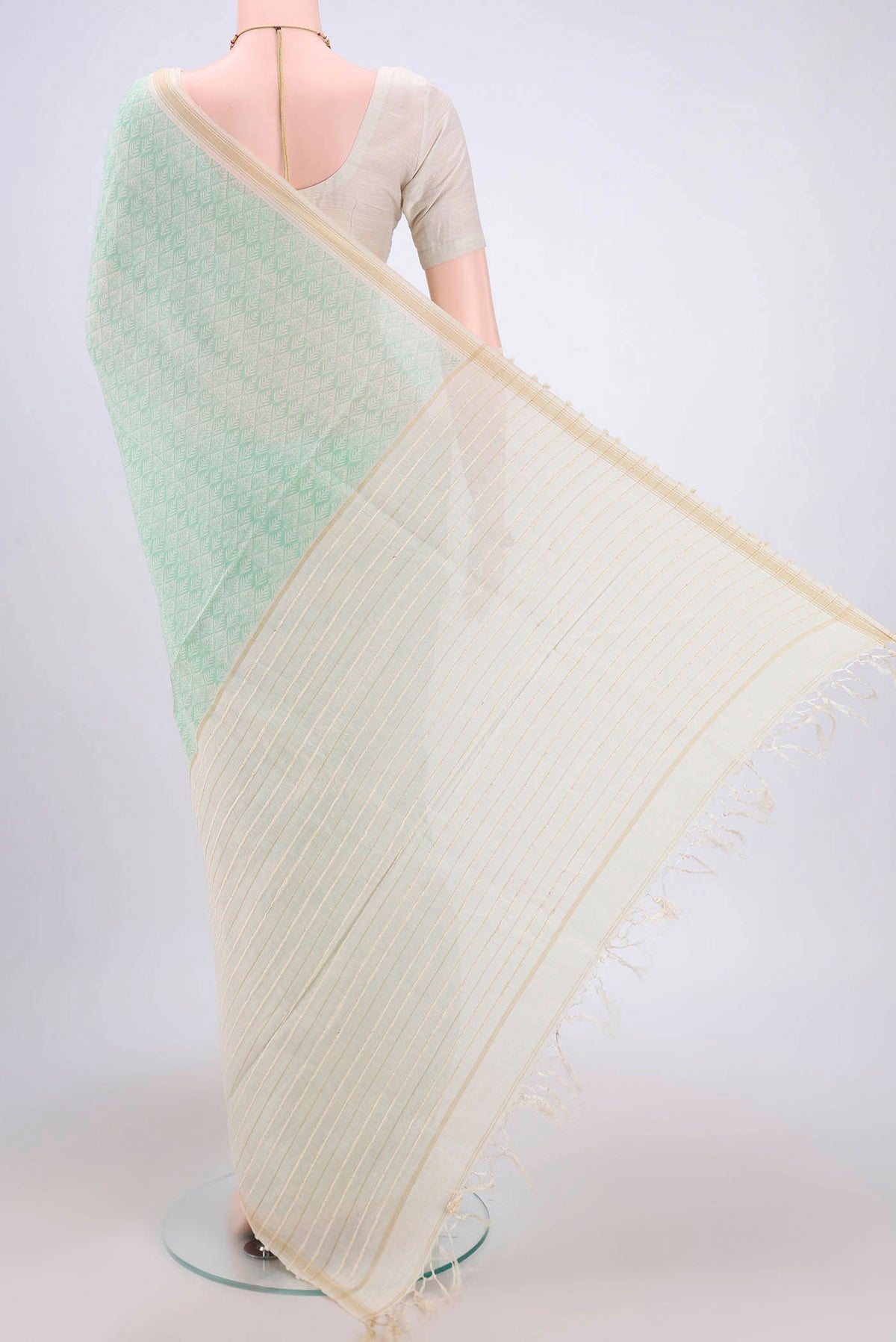 Flat view of Sea Green Tussar Saree with Floral Print on the body and Plain Border. 