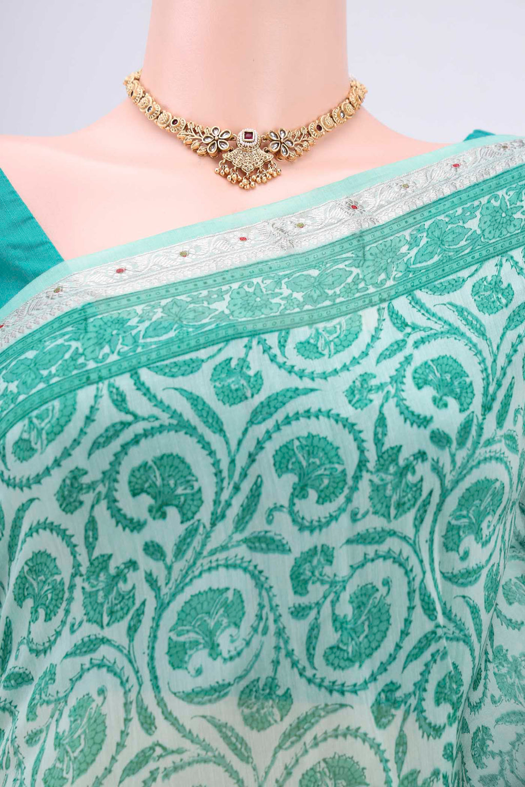 Border image of Sea Green Chanderi Silk Saree with Floral Print on the body and Zari Border. 