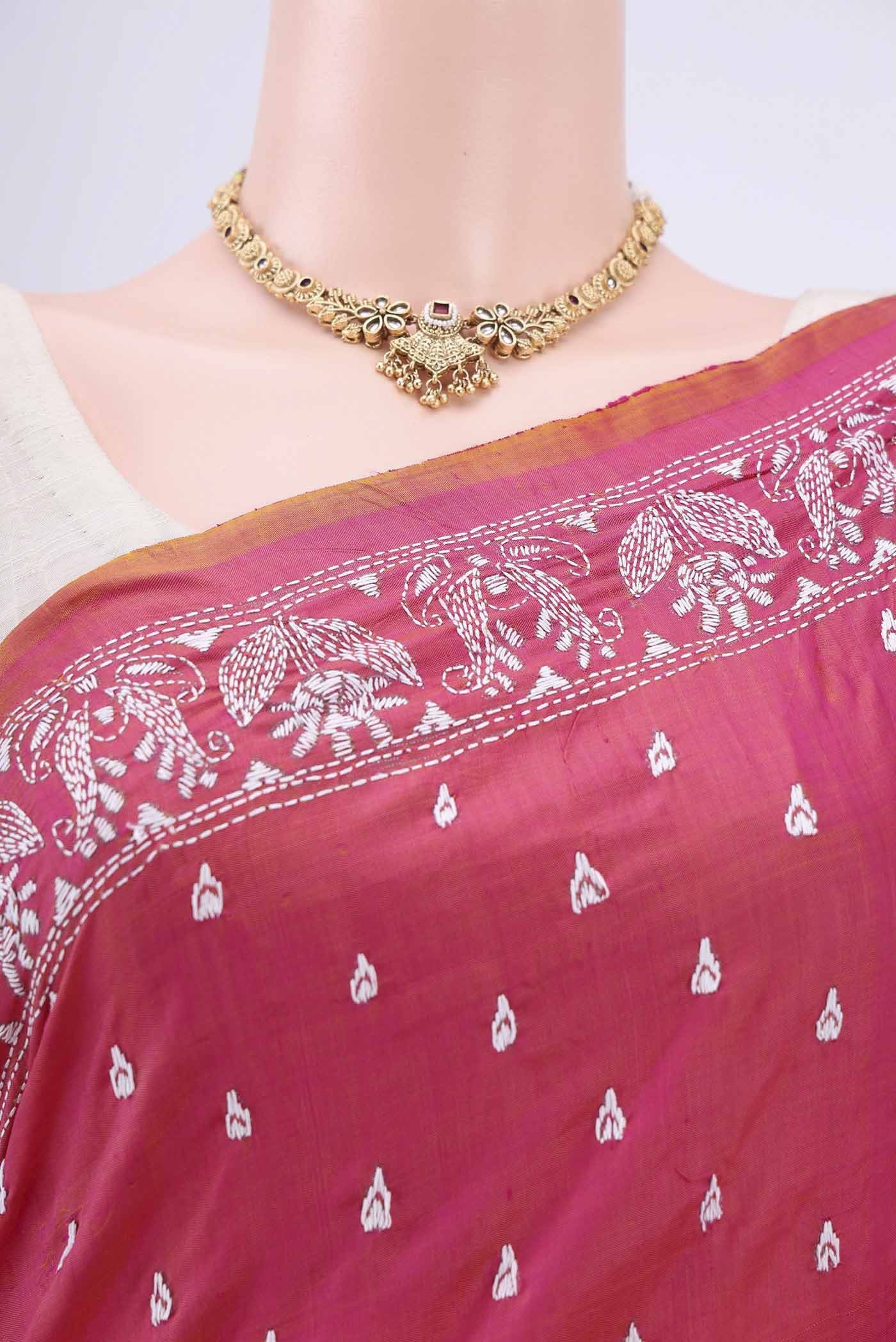 Border image of Dark Pink Kantha Silk Saree with Kantha Work on the body and Thread Border. 