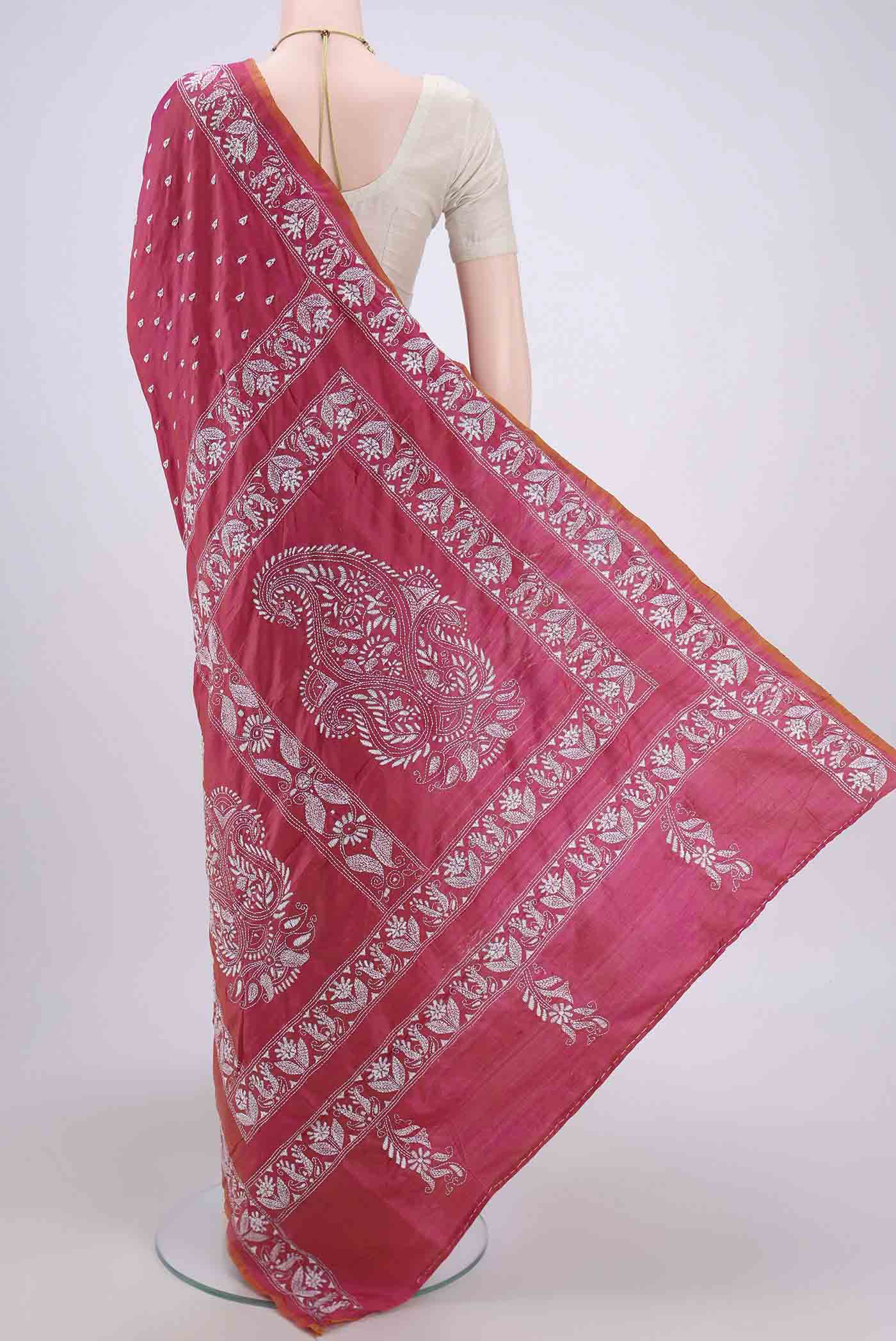 Flat view of Dark Pink Kantha Silk Saree with Kantha Work on the body and Thread Border. 