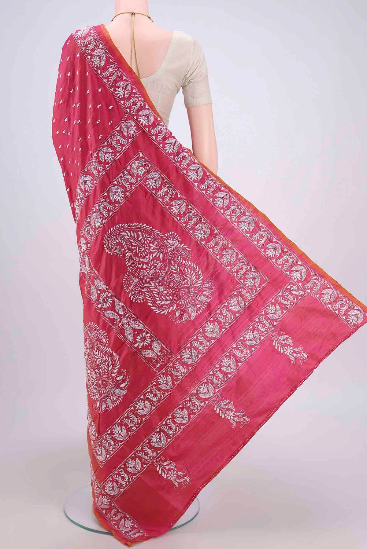 Flat view of Dark Pink Kantha Silk Saree with Kantha Work on the body and Thread Border. 