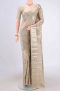 Dark Beige Banarasi Raw Silk Saree with Zari Butta on the body and Zari Border.  displayed on a mannequin