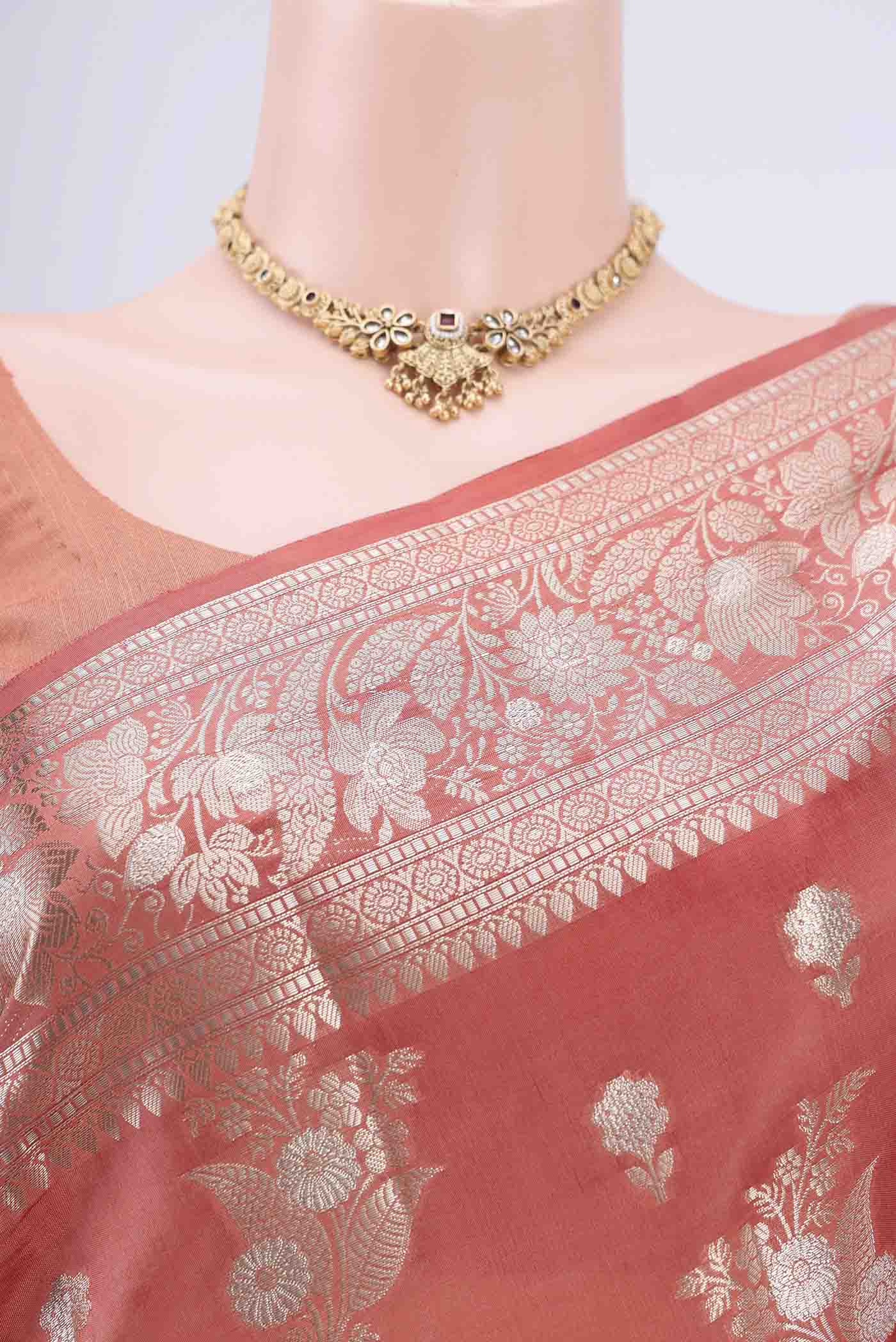 Border image of Peach Banarasi Raw Silk Saree with Zari Butta on the body and Zari Border. 