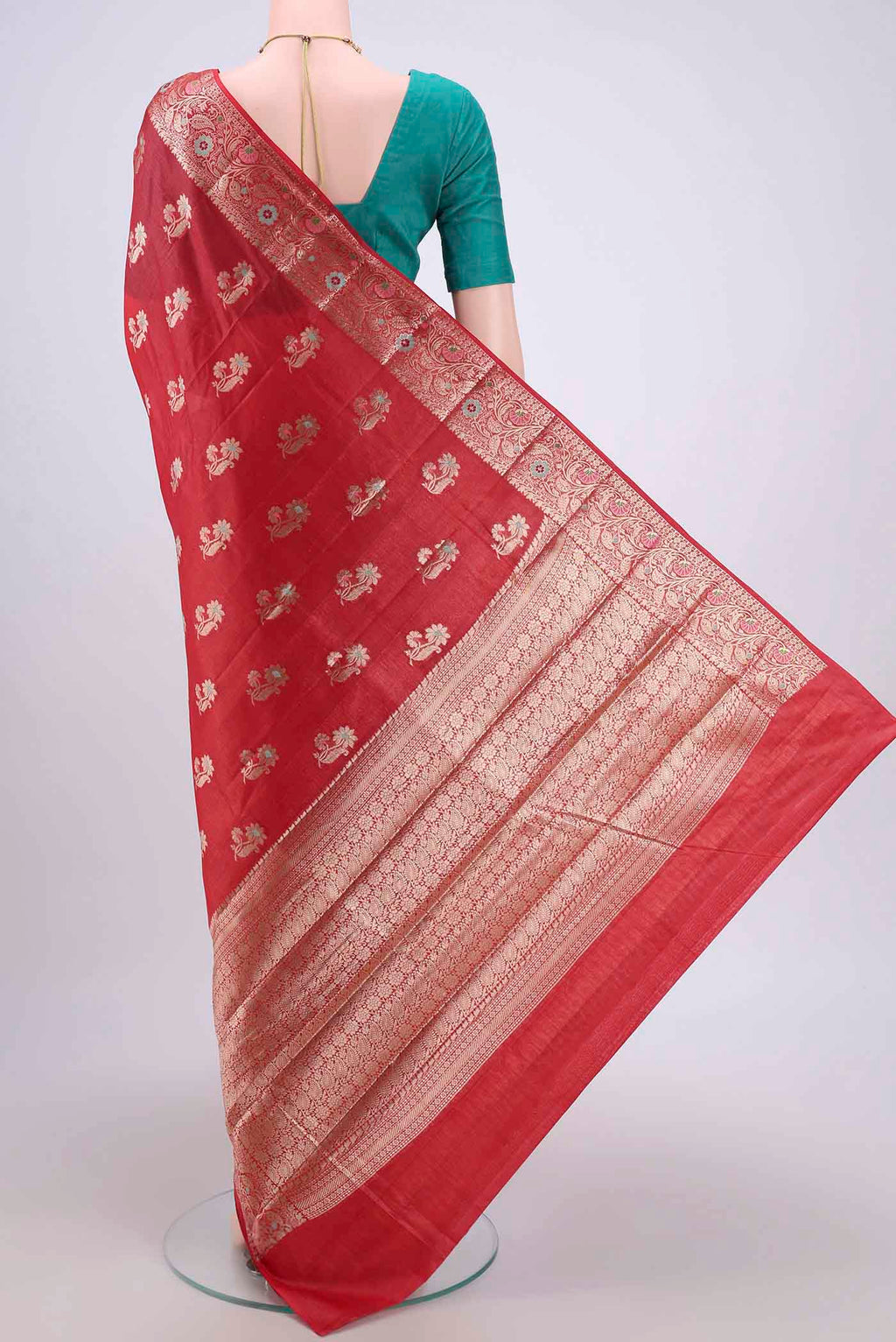 Flat view of Red Banarasi Tussar Silk Saree with Zari And Thread Butta on the body and Zari And Thread Border. 