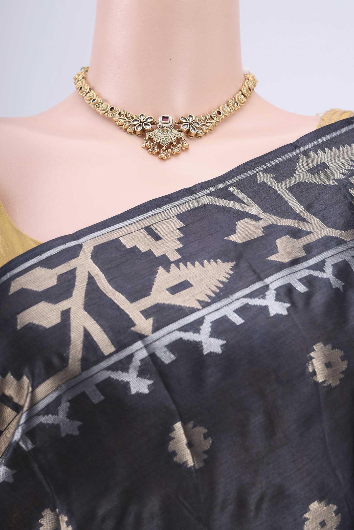 Border image of Davys Grey Banarasi Tussar Silk Saree with Zari Butta on the body and Zari Border. 