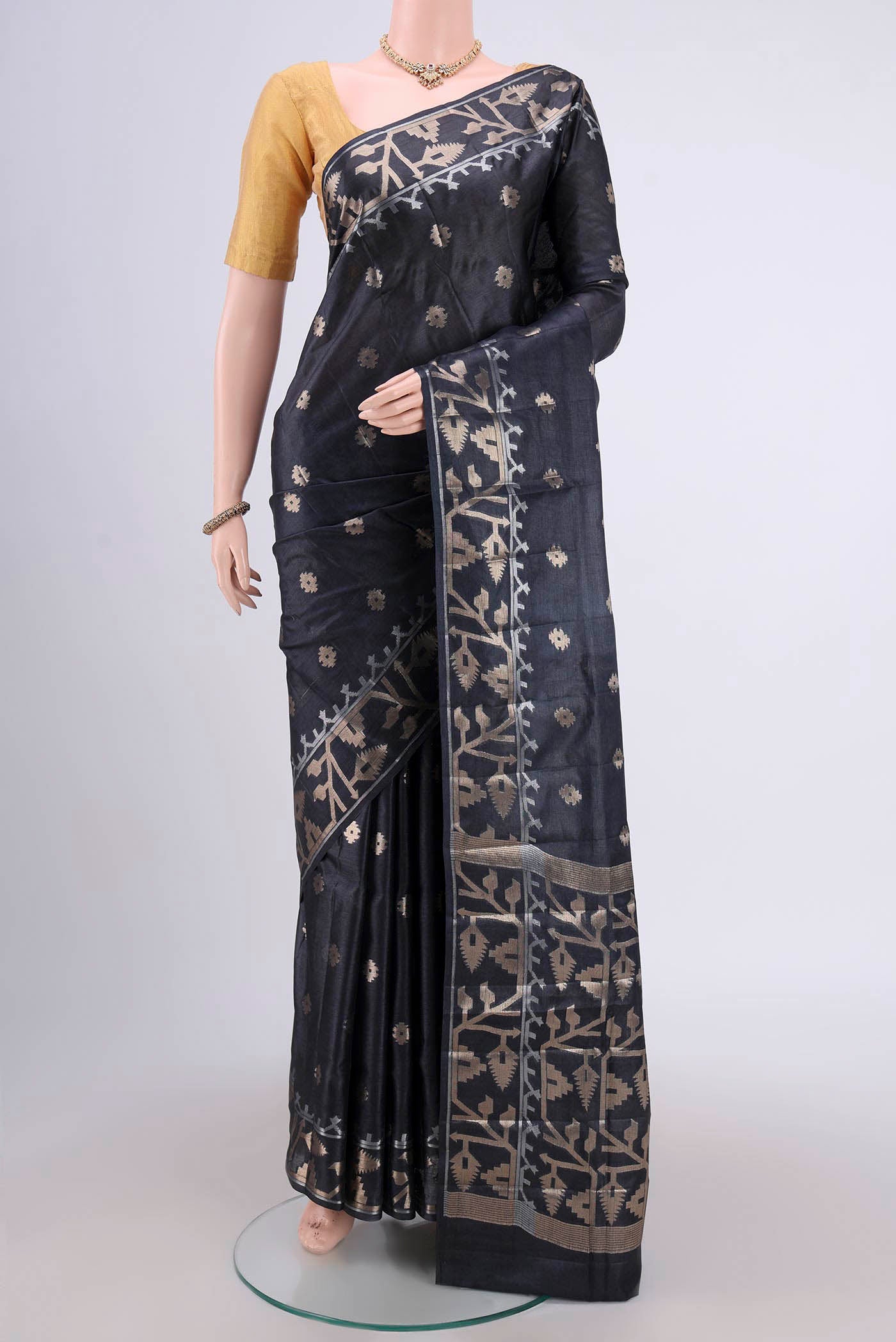 Davys Grey Banarasi Tussar Silk Saree with Zari Butta on the body and Zari Border.  displayed on a mannequin