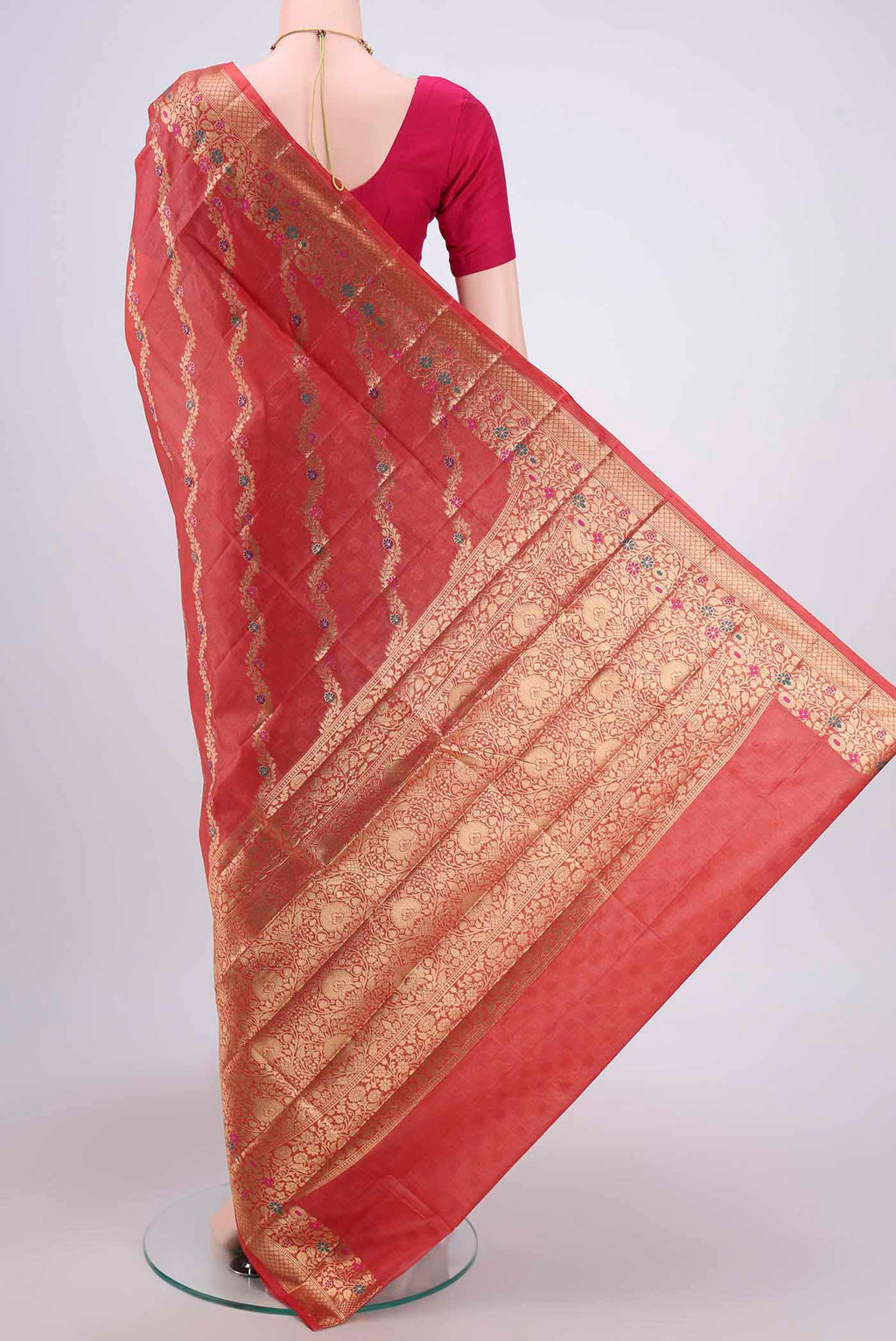 Flat view of Rust Banarasi Tussar Silk Saree with Zari Brocade on the body and Zari And Thread Border. 