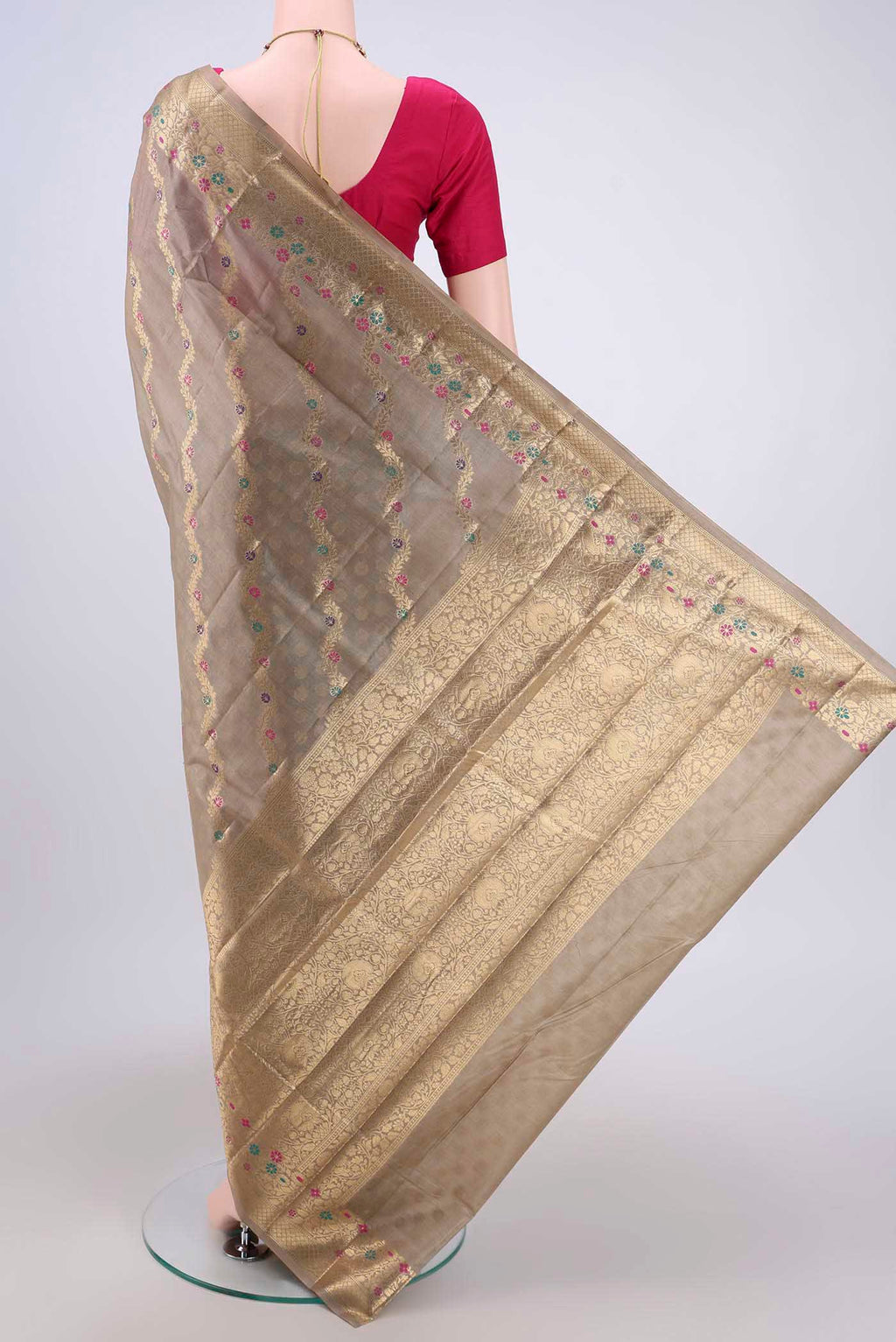 Flat view of Dark Beige Banarasi Tussar Silk Saree with Zari Brocade on the body and Zari And Thread Border. 