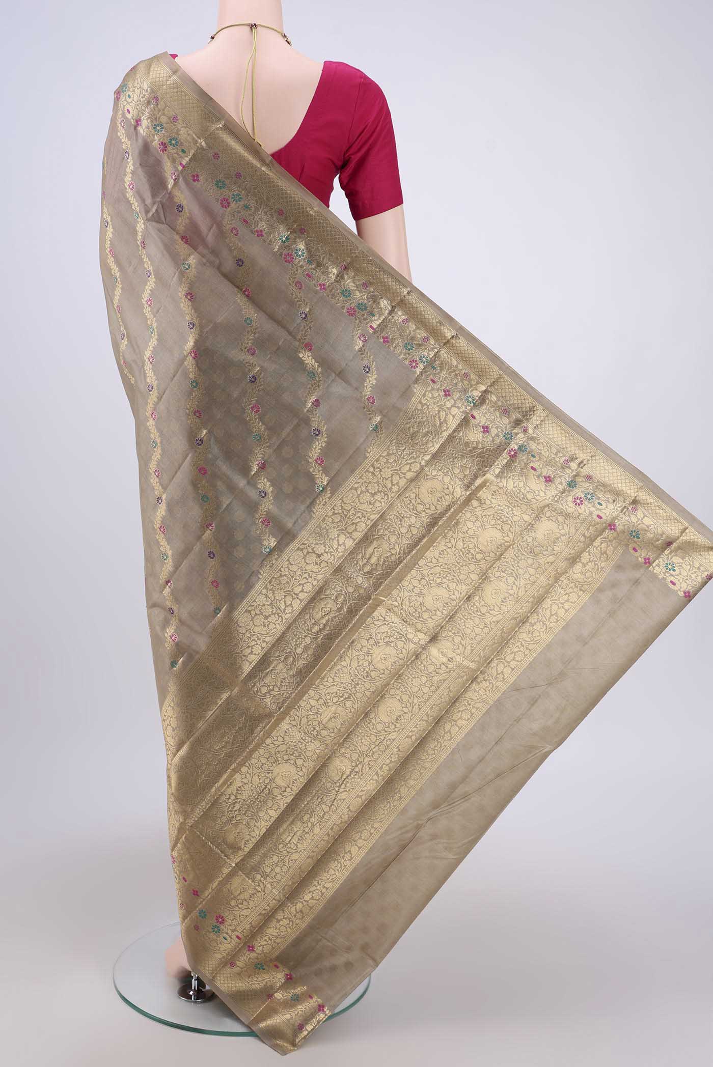 Flat view of Dark Beige Banarasi Tussar Silk Saree with Zari Brocade on the body and Zari And Thread Border. 