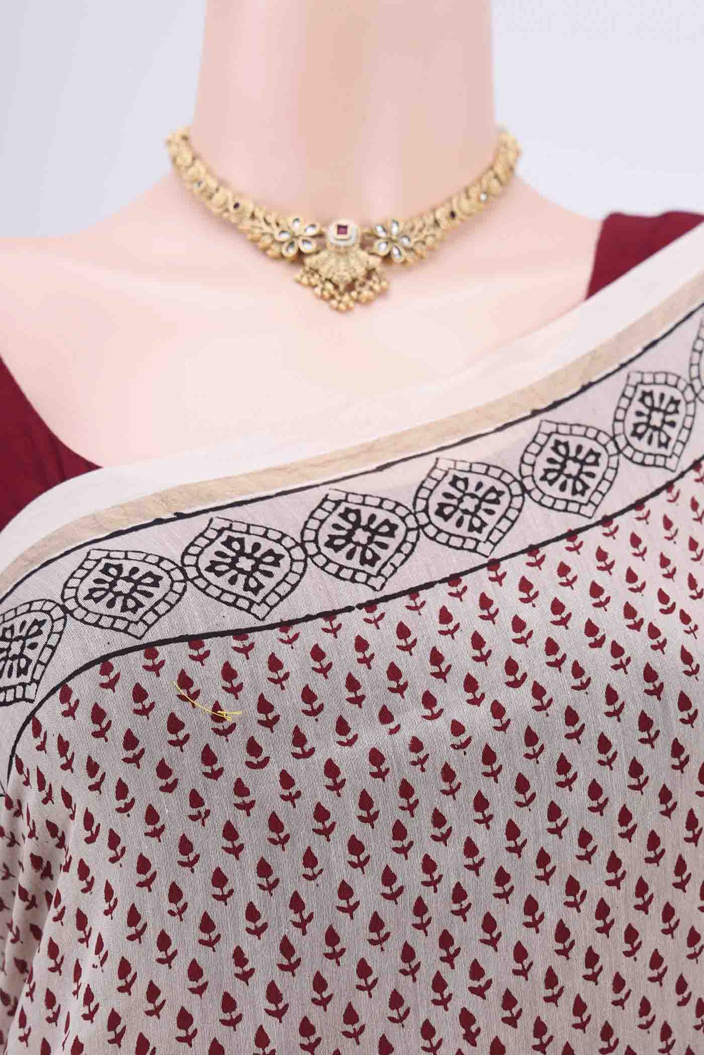 Border image of Off White Maheshwari Silk Cotton Saree with Printed design on the body and Zari Border. 