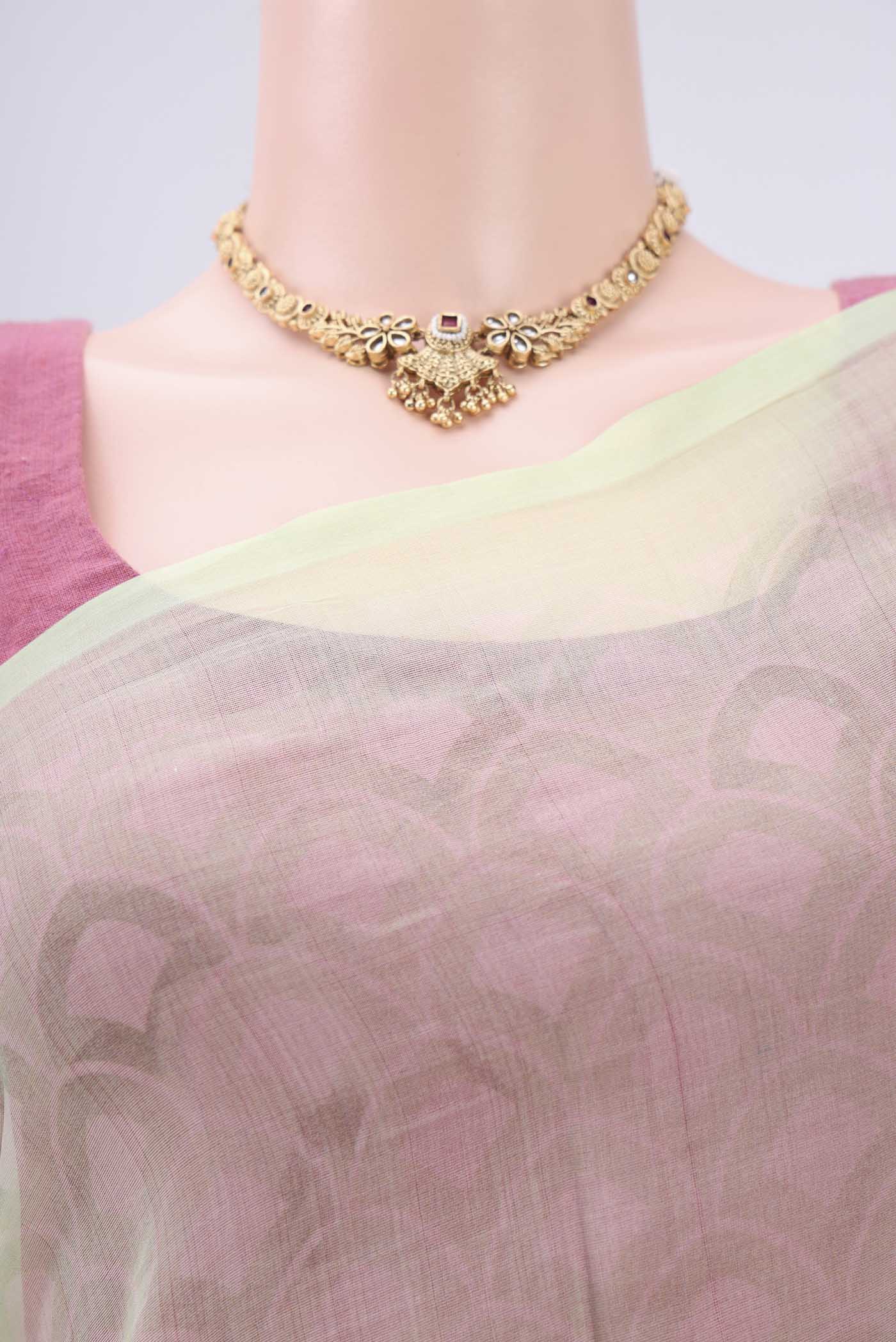 Border image of Mint Green Organza Silk Saree with Printed design on the body and Plain Border. 