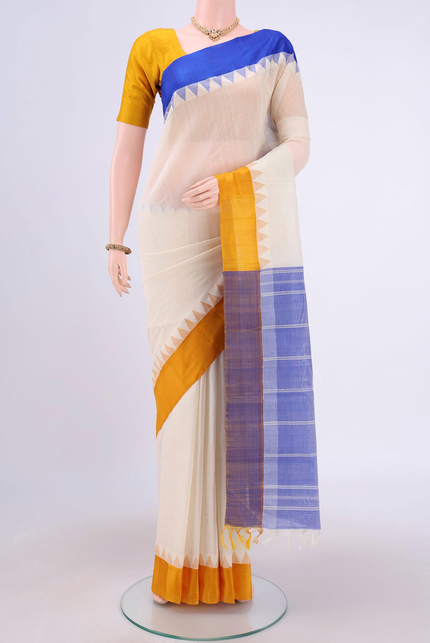 Cream Kanchi Cotton Saree with Plain Body and Silk Border.  displayed on a mannequin