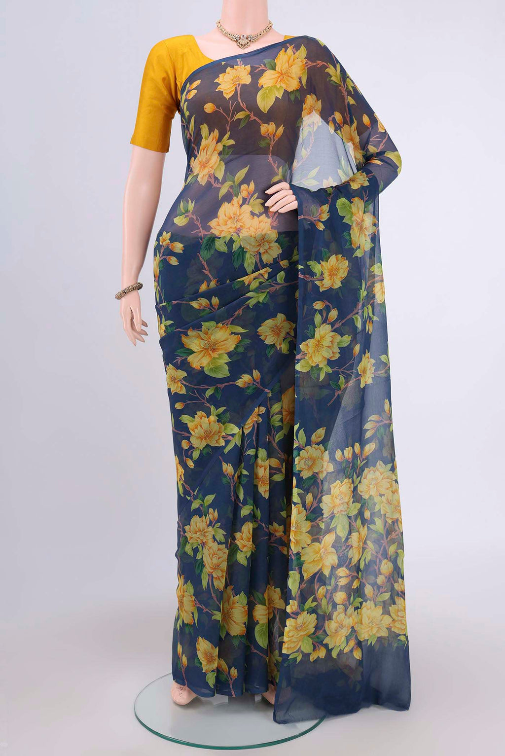 Navy Blue Dual Tone Mysore Crepe Saree with Floral Print on the body and Plain Border.  displayed on a mannequin