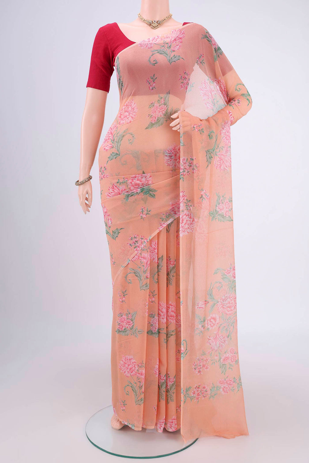 Peach Mysore Chiffon Saree with Floral Print on the body and Without Border.  displayed on a mannequin