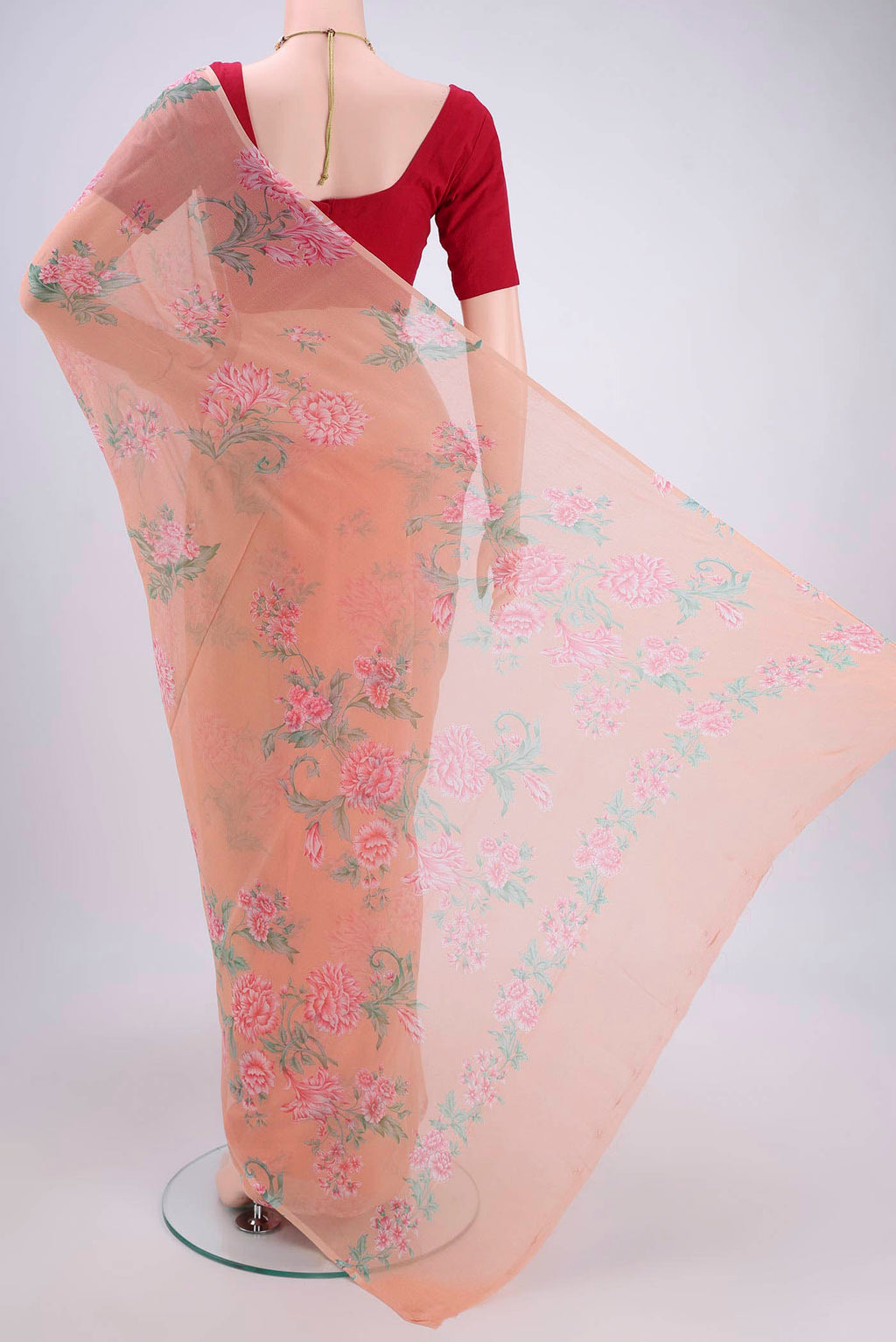 Flat view of Peach Mysore Chiffon Saree with Floral Print on the body and Without Border. 