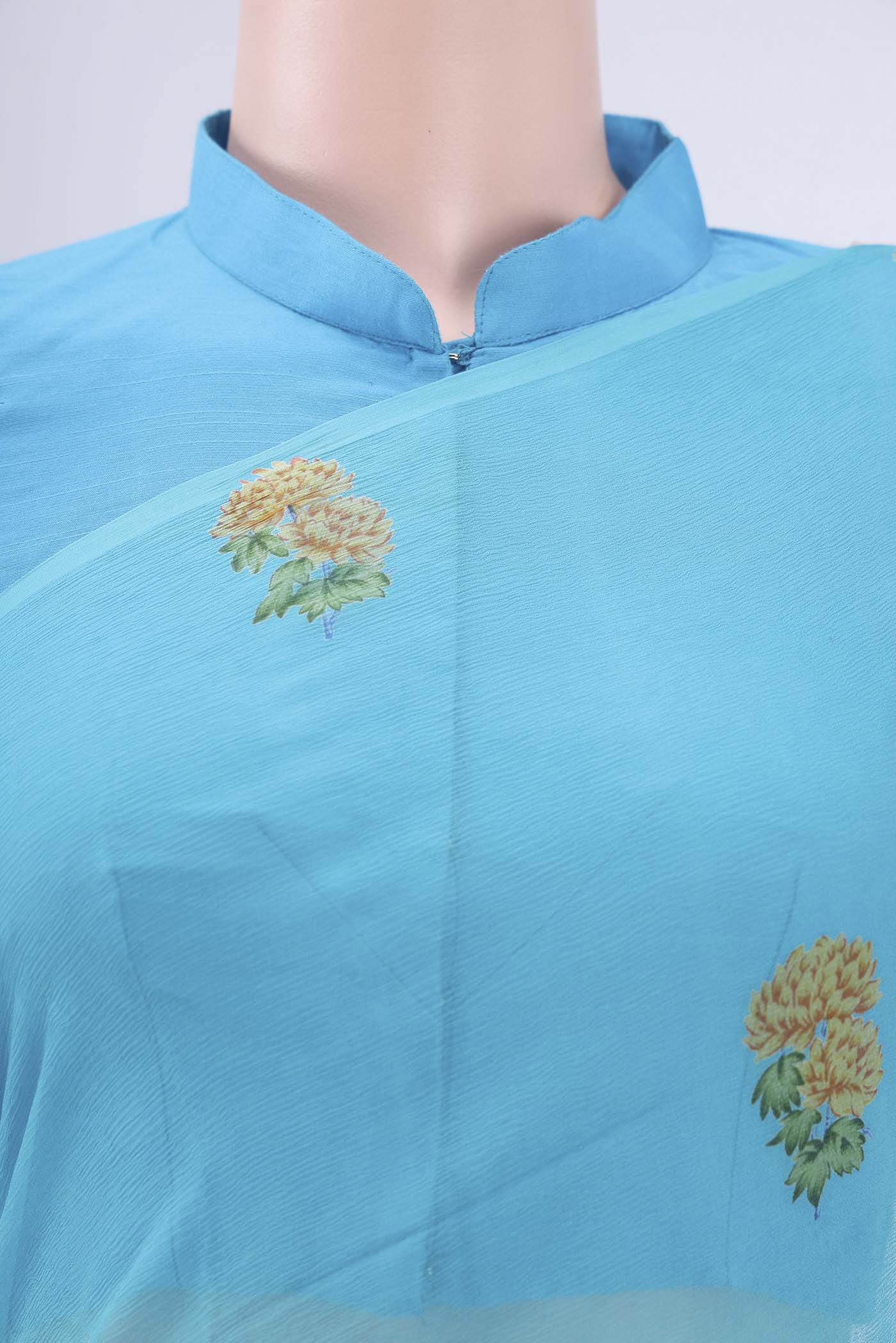 Border image of Electric Blue Mysore Crepe Saree with Floral Print on the body and Zari Border. 