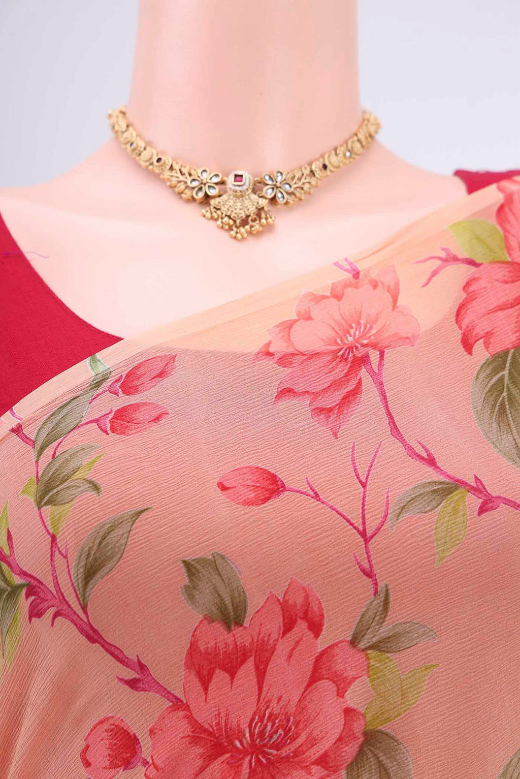 Border image of Peach Dual Tone Mysore Crepe Saree with Printed design on the body and Plain Border. 