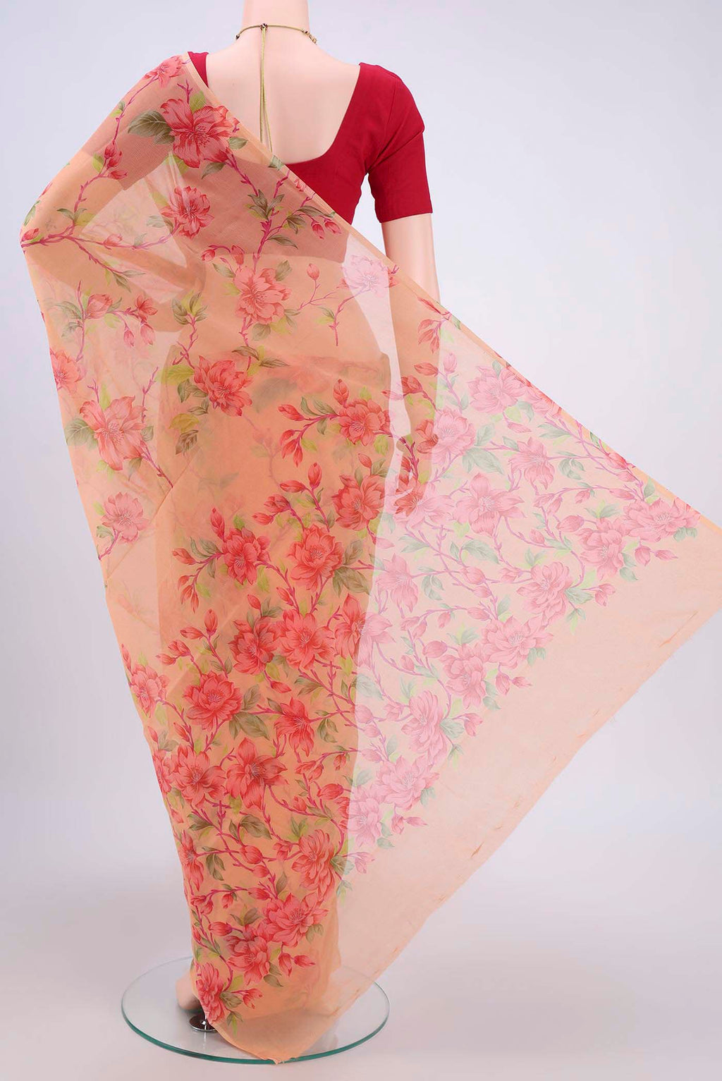 Flat view of Peach Dual Tone Mysore Crepe Saree with Printed design on the body and Plain Border. 