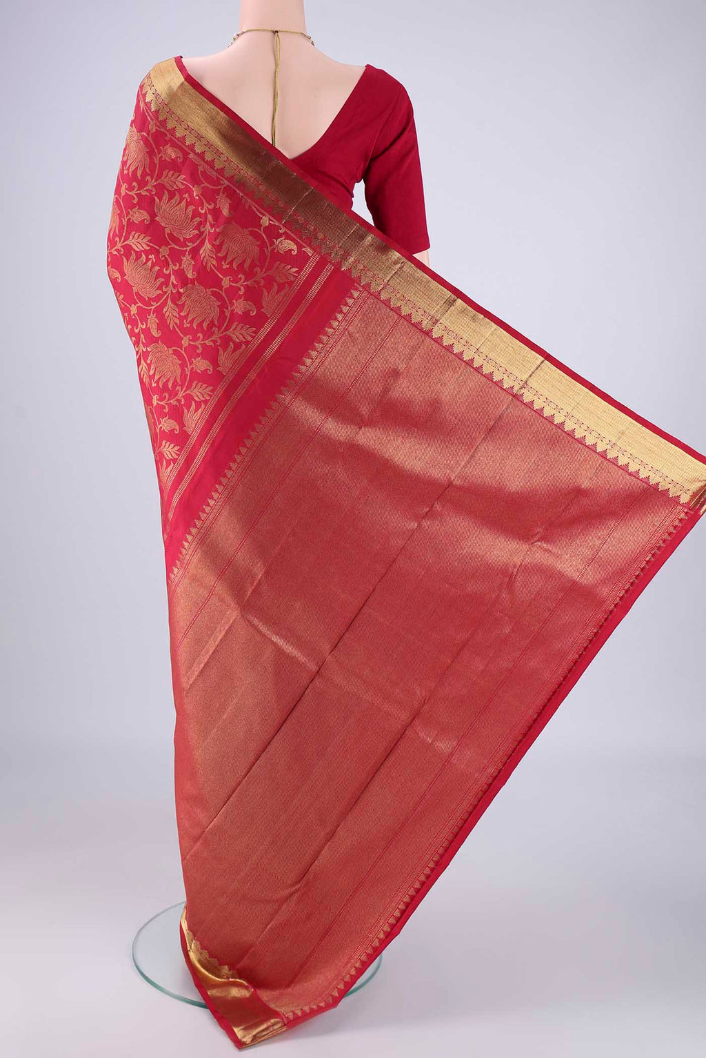 Flat view of Maroon Kanjivaram Silk Saree with Zari Brocade on the body and Zari Border. 
