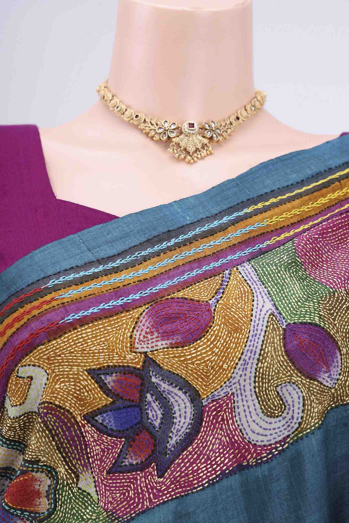 Border image of Sea Green Kantha Silk Saree with Kantha Work on the body and Thread Border. 