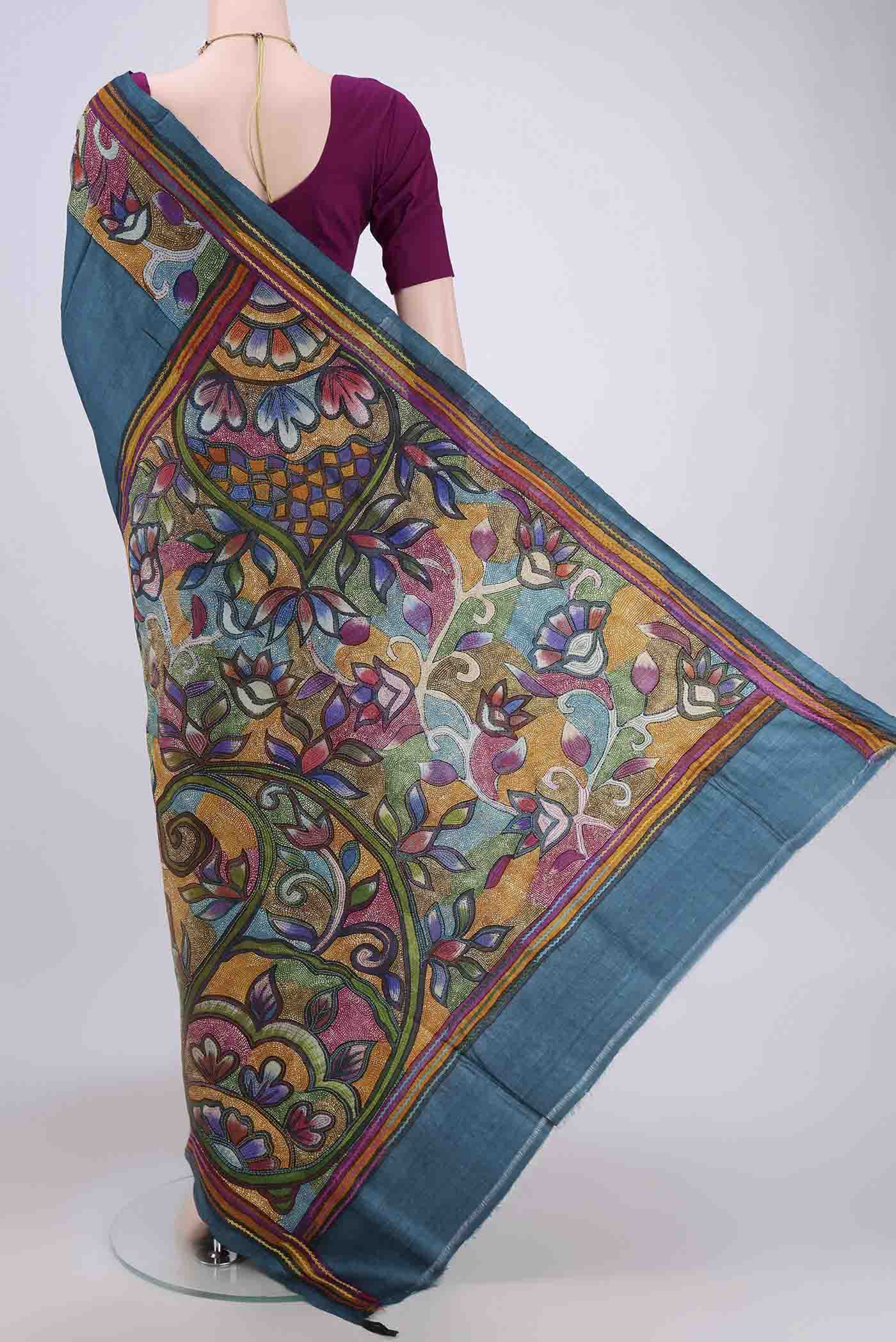 Flat view of Sea Green Kantha Silk Saree with Kantha Work on the body and Thread Border. 