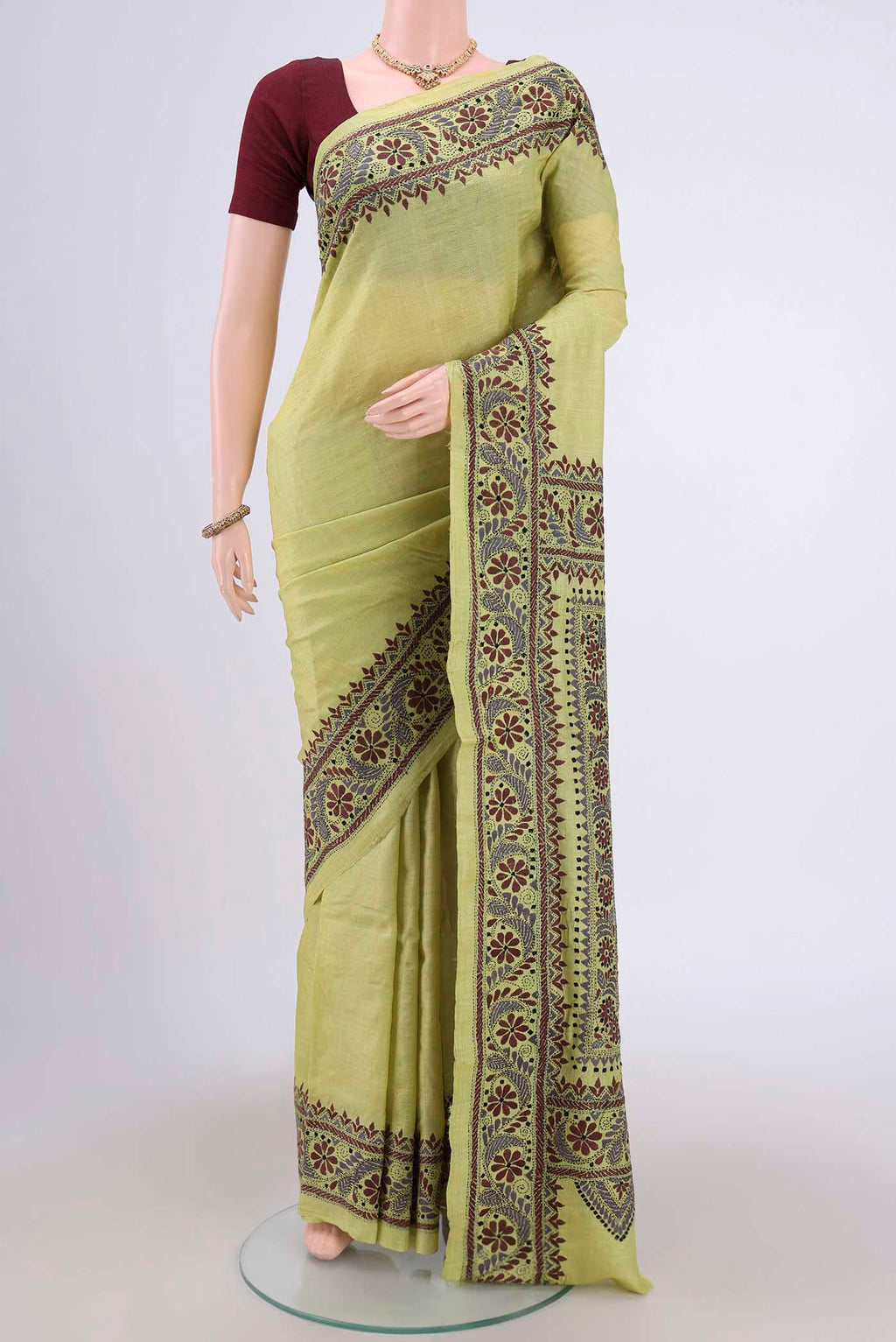 Acid Green Kantha Silk Saree with Kantha Work on the body and Thread Border.  displayed on a mannequin