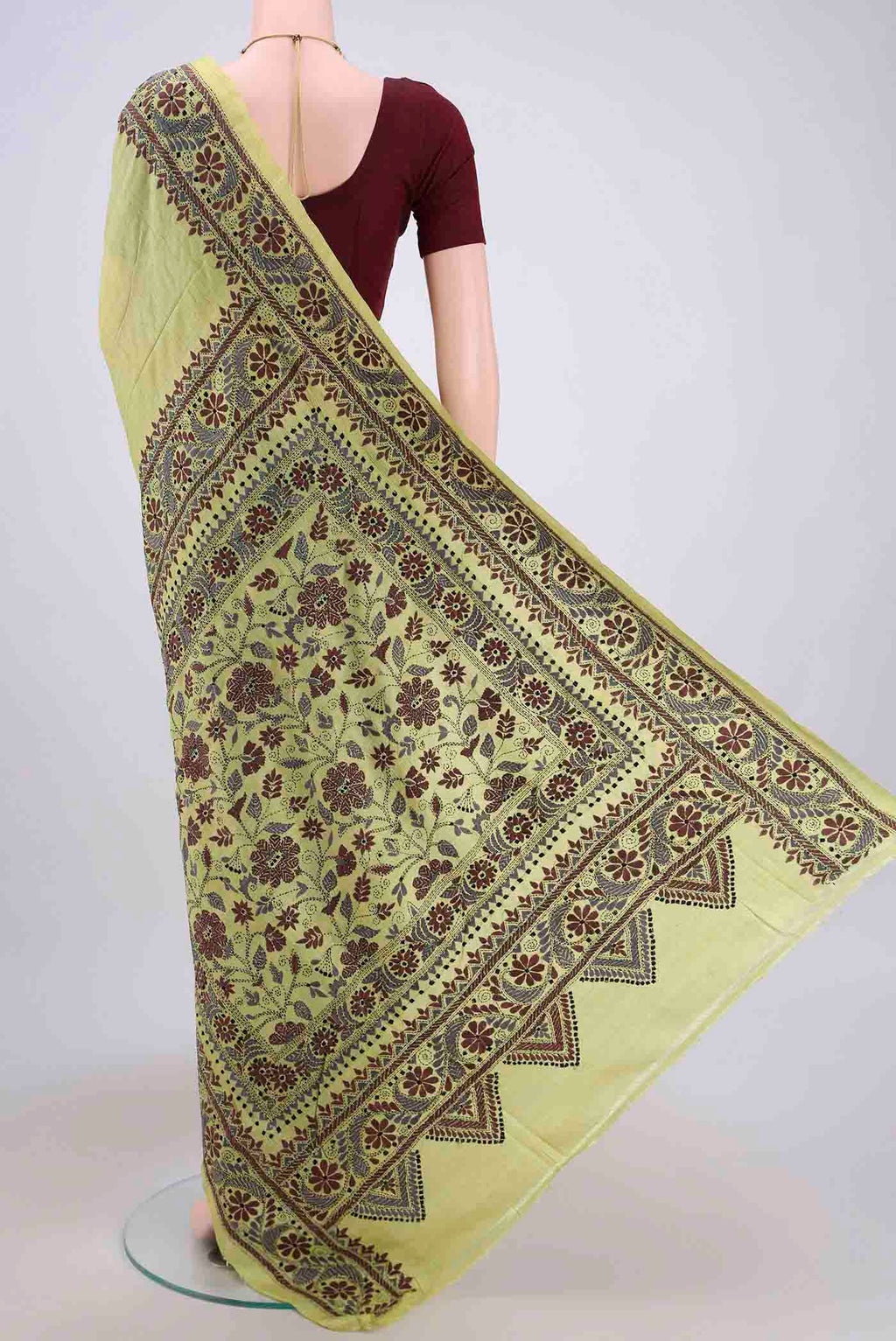 Flat view of Acid Green Kantha Silk Saree with Kantha Work on the body and Thread Border. 