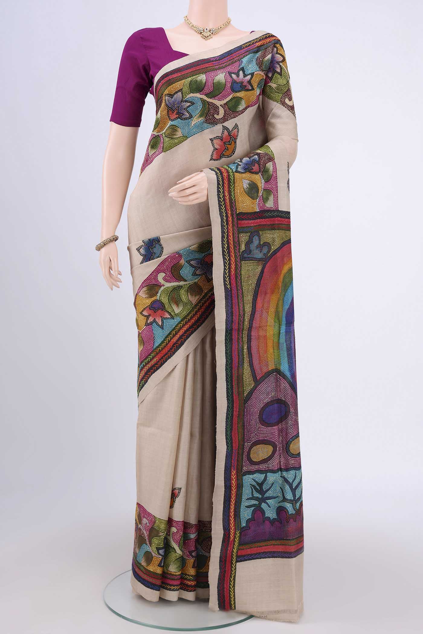 Beige Kantha Silk Saree with Kantha Work on the body and Thread Border.  displayed on a mannequin