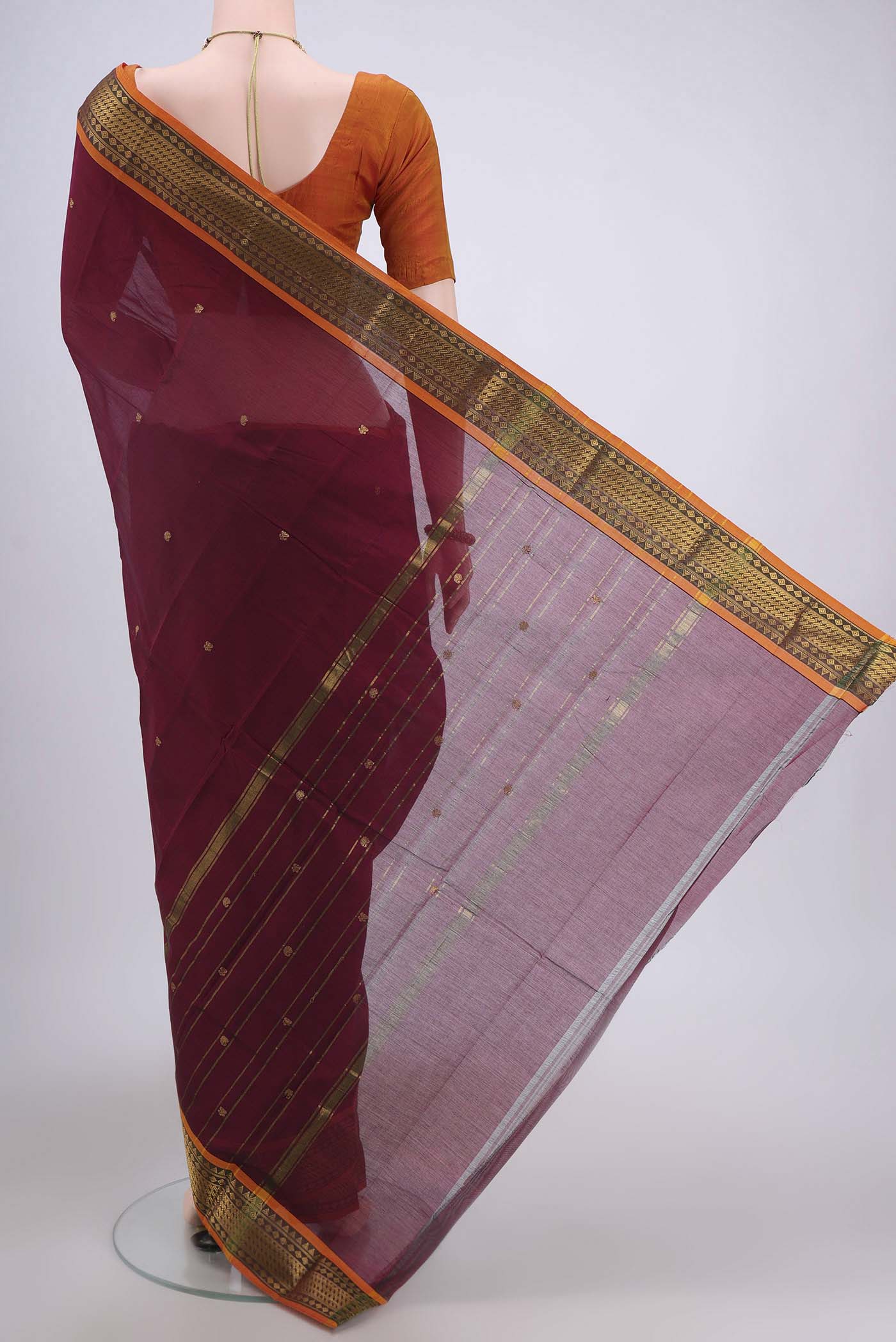 Flat view of Turquoise Kanchi Cotton Saree with Zari Butta on the body and Zari Border. 
