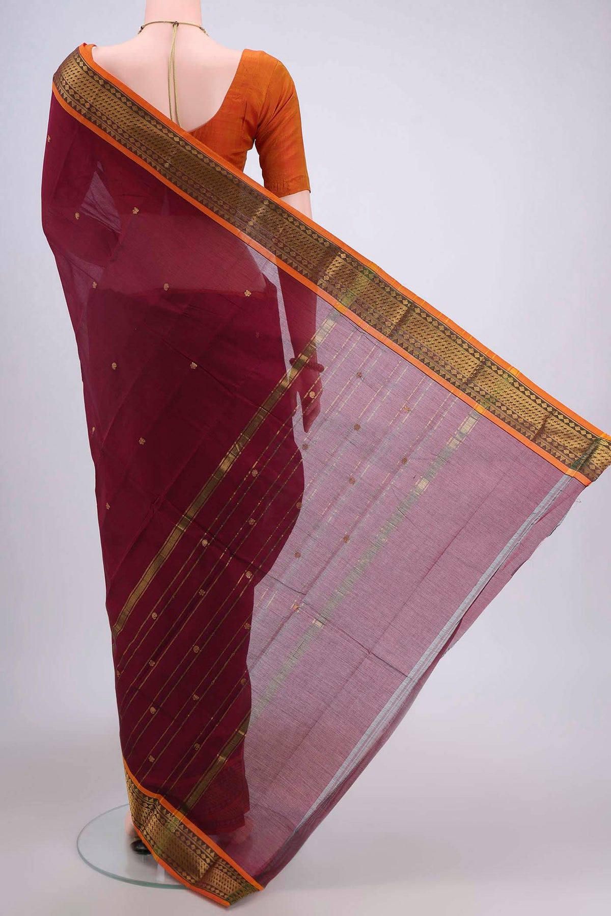 Flat view of Turquoise Kanchi Cotton Saree with Zari Butta on the body and Zari Border. 
