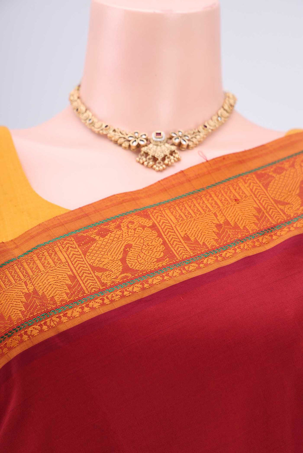 Border image of Maroon Blended Poly Cotton Saree with Plain Body and Thread Border. 