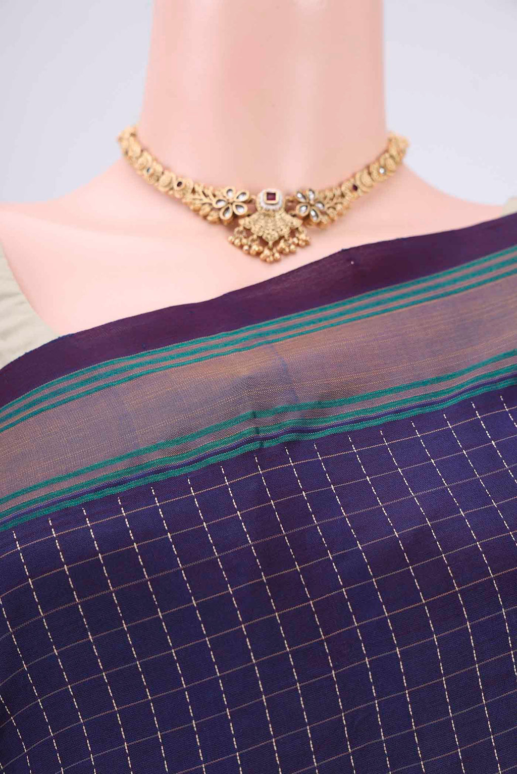 Border image of Burgundy Blended Poly Cotton Saree with Checked design on the body and Thread Border. 