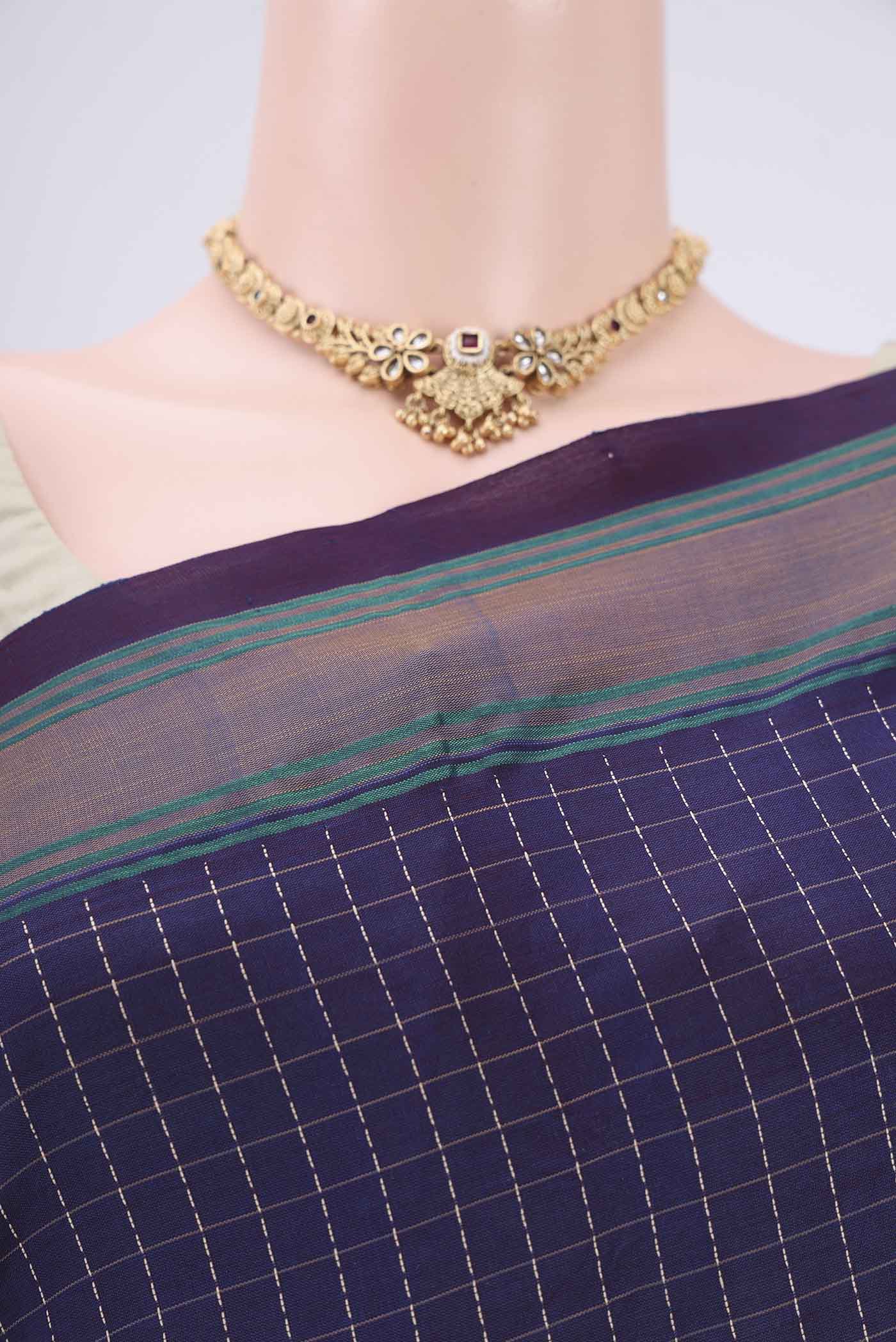 Border image of Burgundy Blended Poly Cotton Saree with Checked design on the body and Thread Border. 