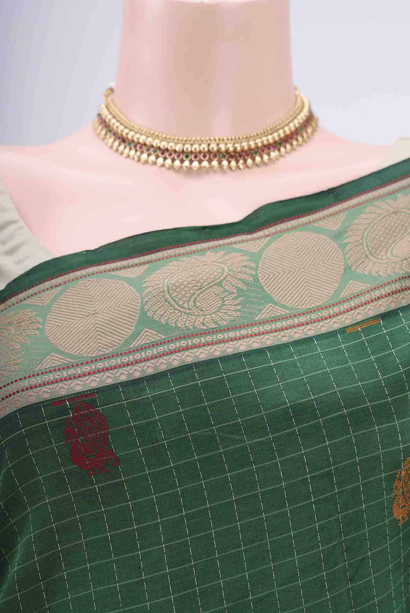 Border image of Bottle Green Blended Poly Cotton Saree with Checked design on the body and Thread Border. 