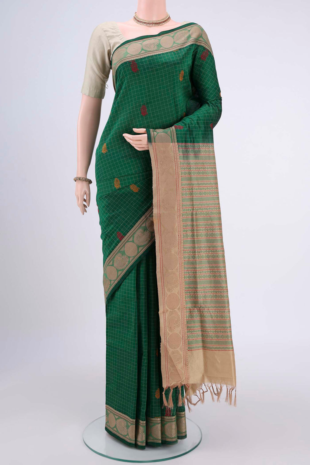 Bottle Green Blended Poly Cotton Saree with Checked design on the body and Thread Border.  displayed on a mannequin
