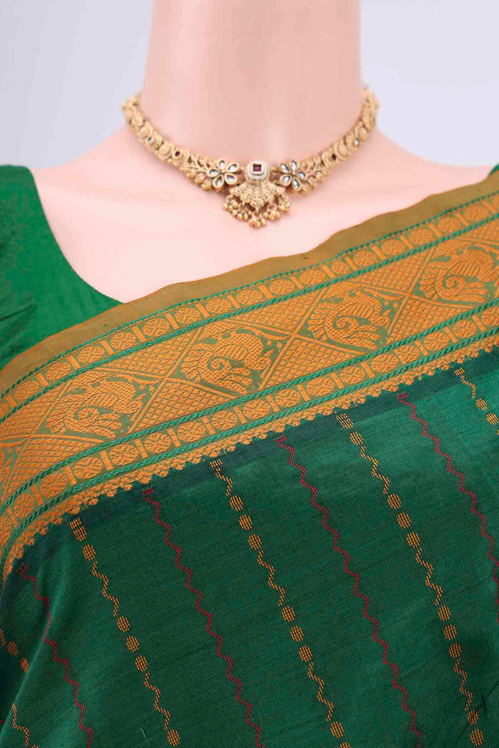 Border image of Green Blended Silk Cotton Saree with Stripes on the body and Thread Border. 