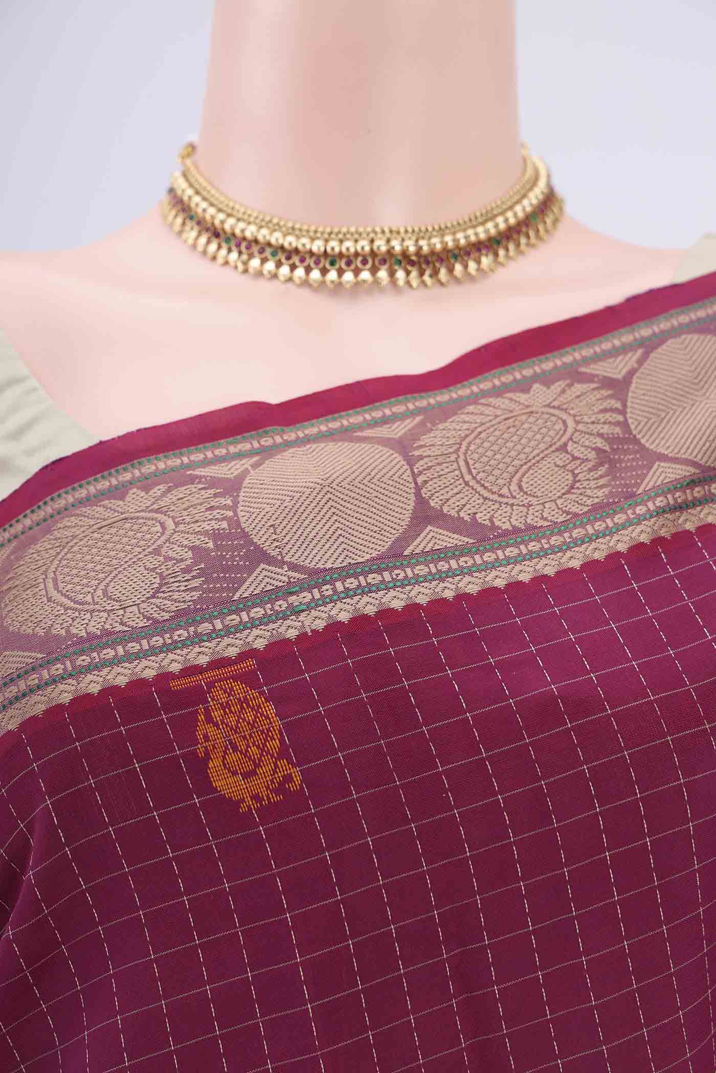 Border image of Magenta Blended Poly Cotton Saree with Checked design on the body and Thread Border. 