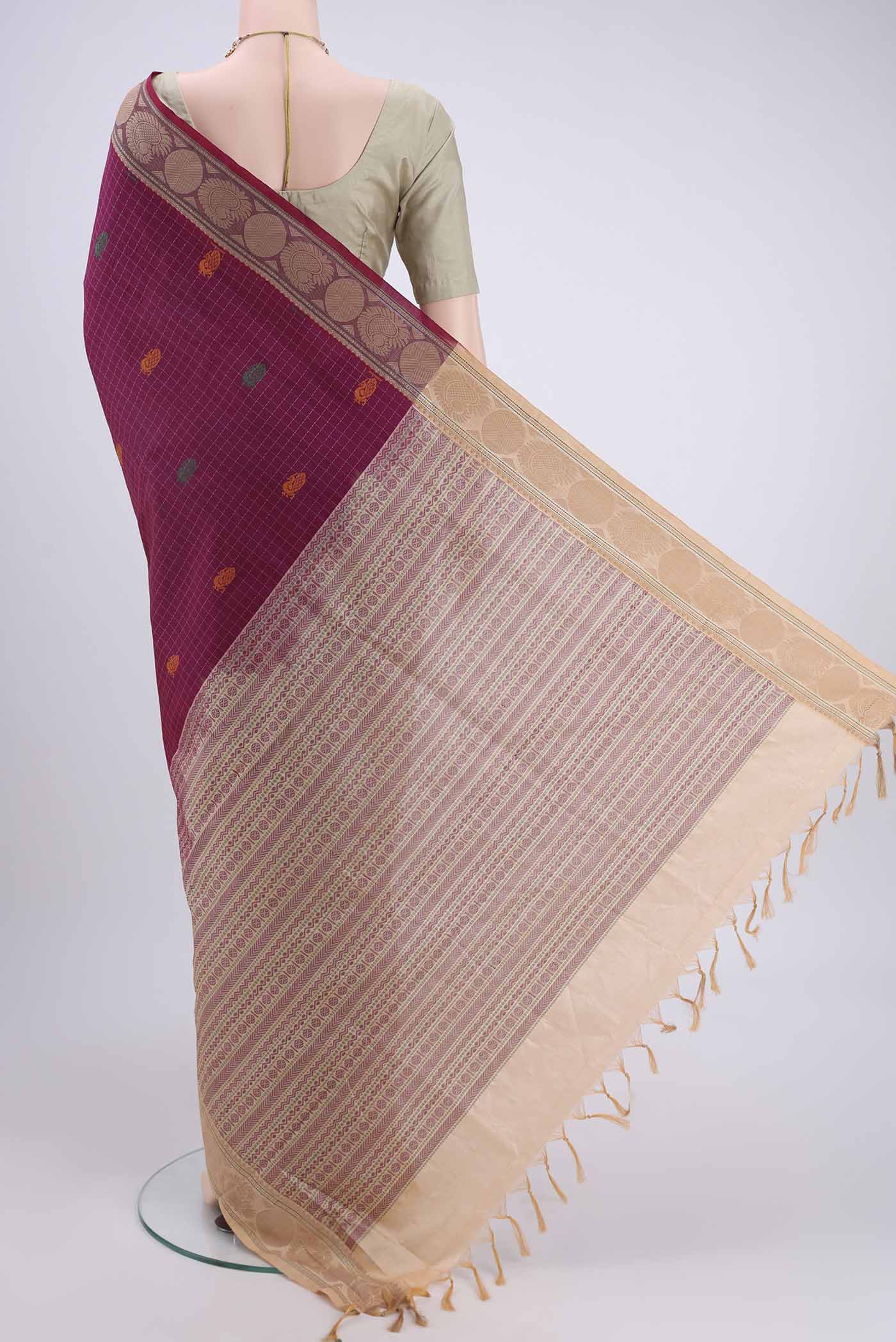 Flat view of Magenta Blended Poly Cotton Saree with Checked design on the body and Thread Border. 