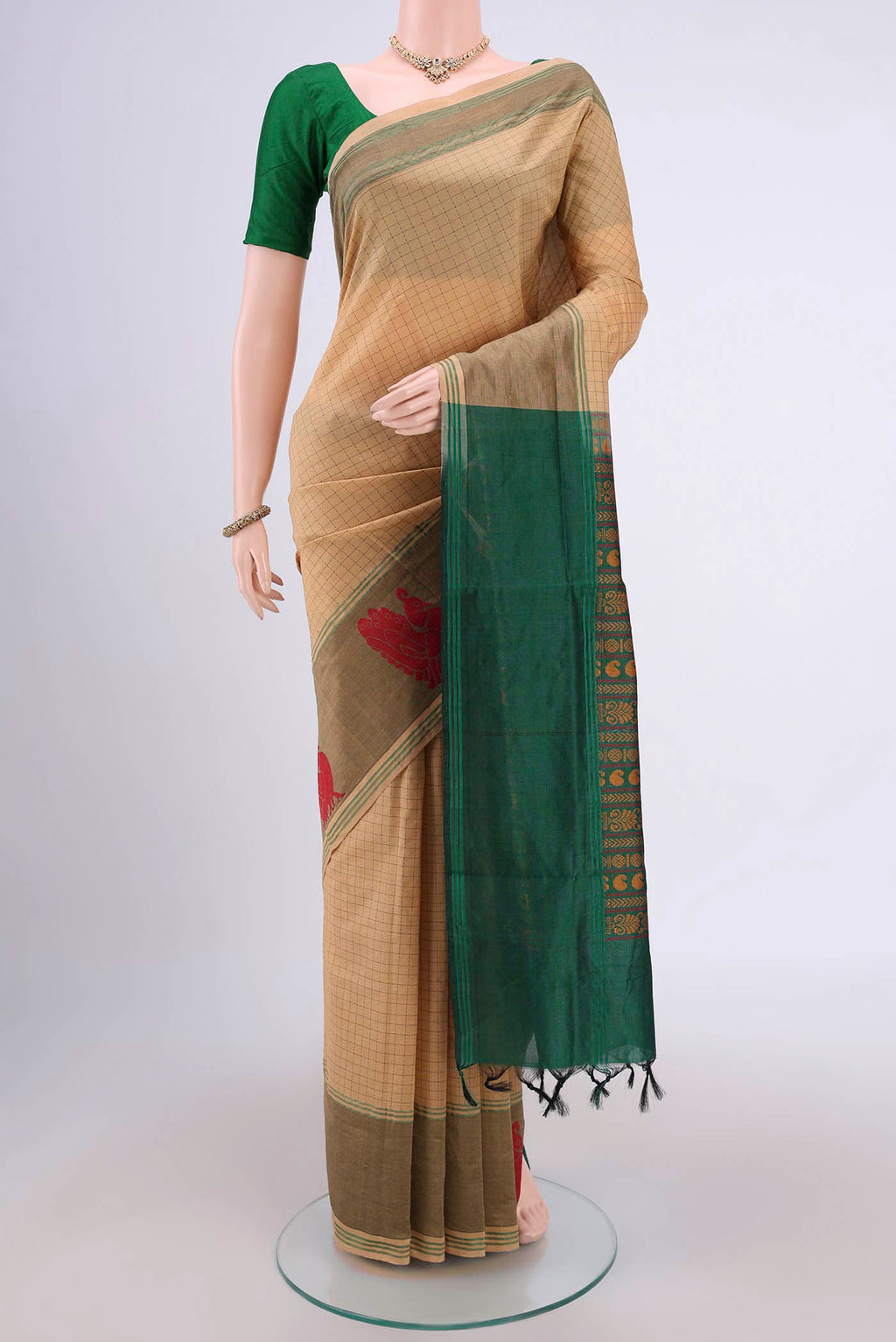 Beige Blended Silk Cotton Saree with Checked design on the body and Thread Border.  displayed on a mannequin