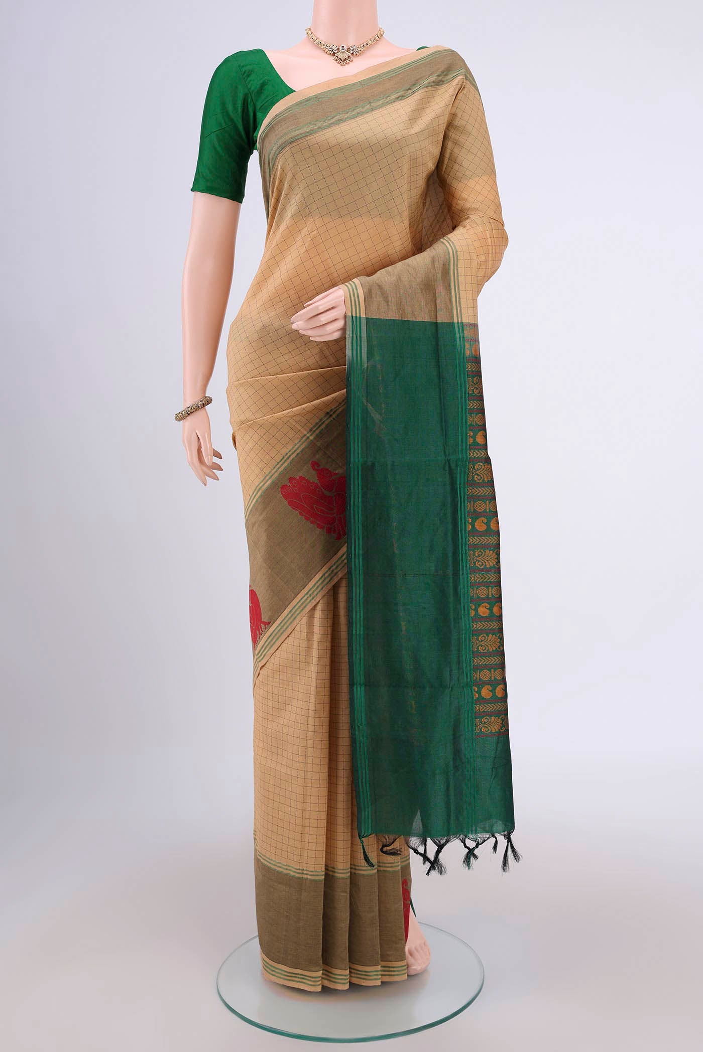 Beige Blended Silk Cotton Saree with Checked design on the body and Thread Border.  displayed on a mannequin