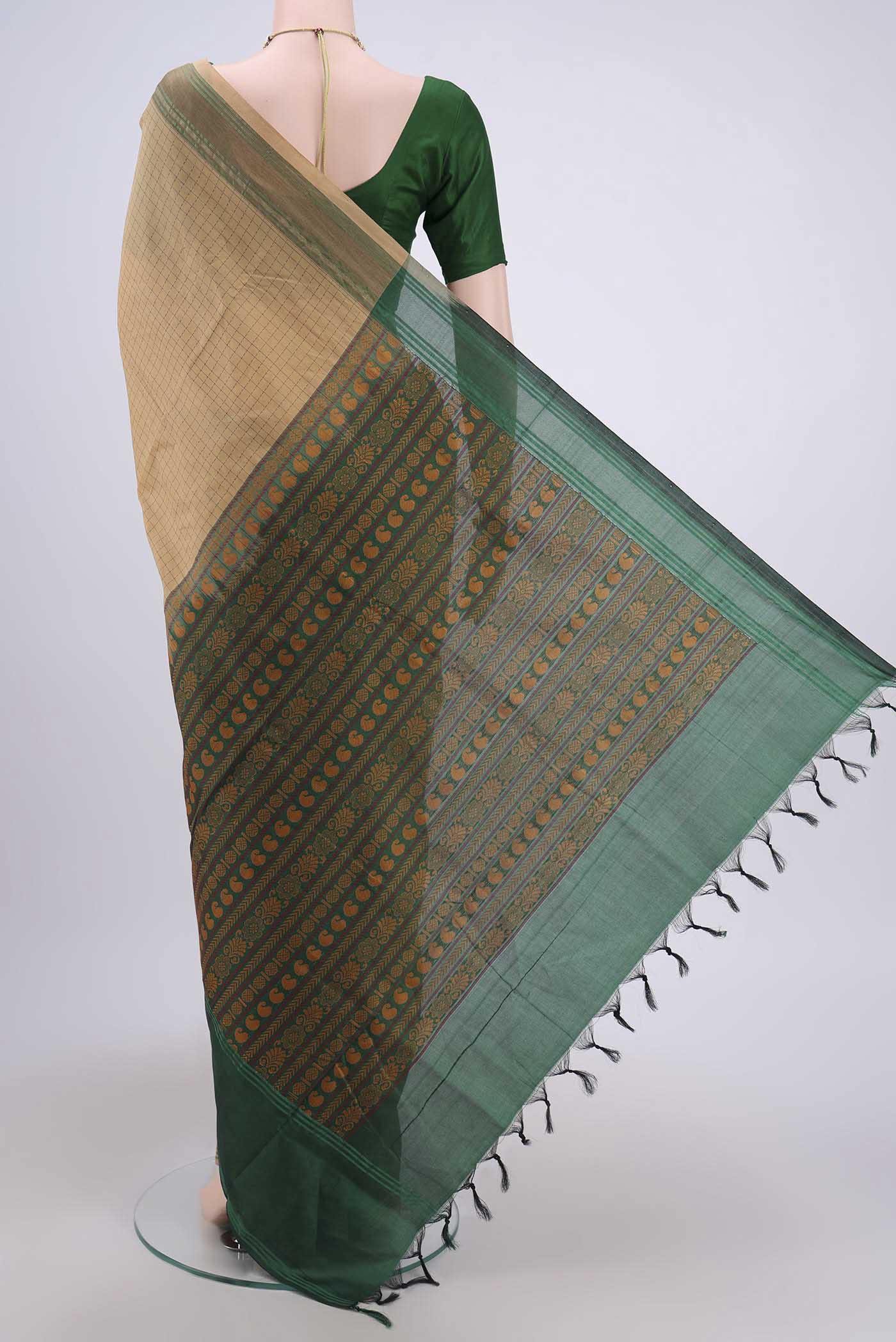 Flat view of Beige Blended Silk Cotton Saree with Checked design on the body and Thread Border. 