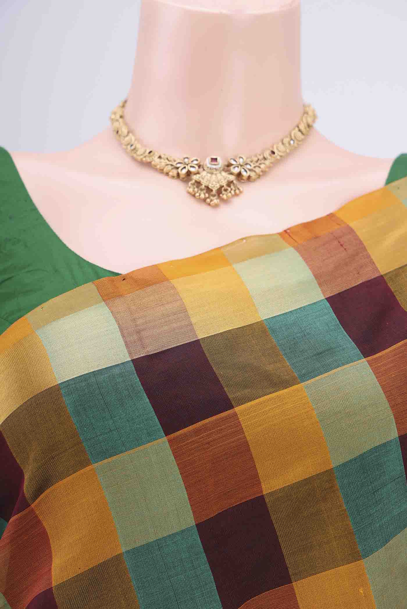 Border image of Multi Color Blended Poly Cotton Saree with Checked design on the body and Zari Border. 