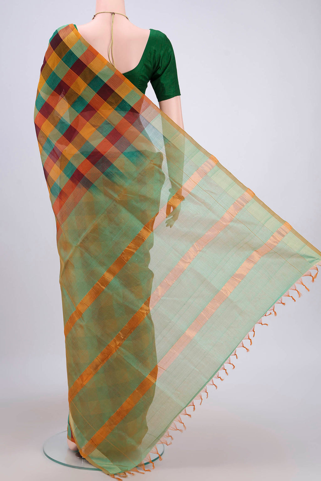 Flat view of Multi Color Blended Poly Cotton Saree with Checked design on the body and Zari Border. 