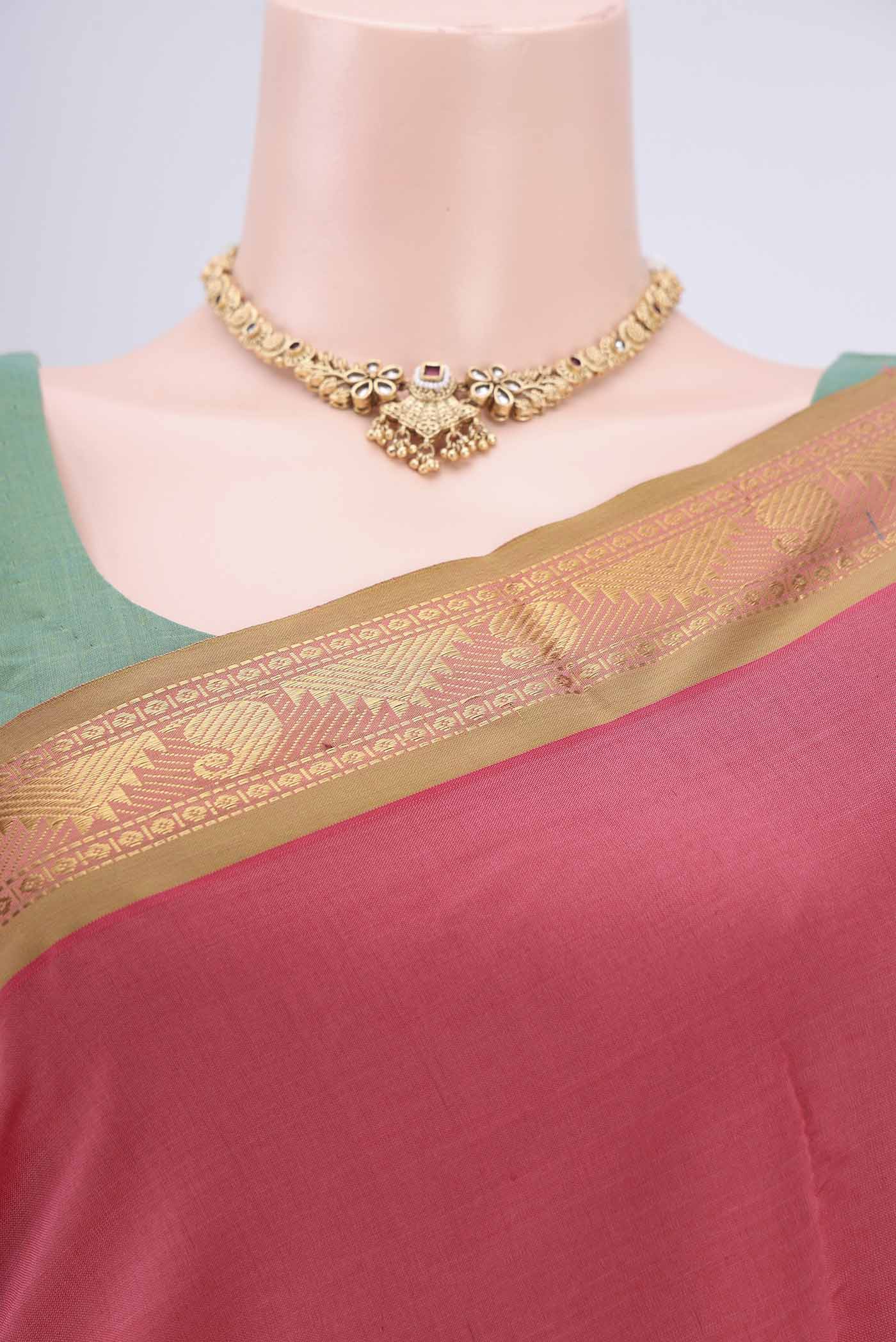 Border image of Peach Blended Poly Cotton Saree with Plain Body and Zari Border. 