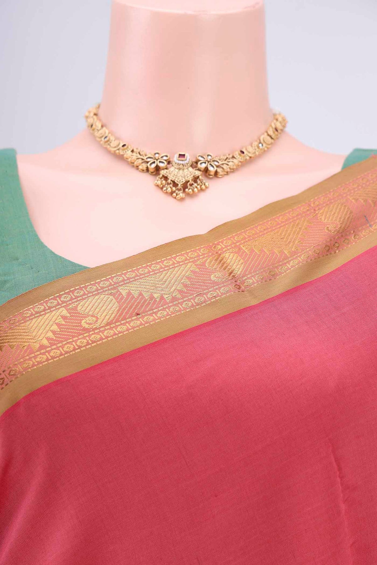 Border image of Peach Blended Poly Cotton Saree with Plain Body and Zari Border. 