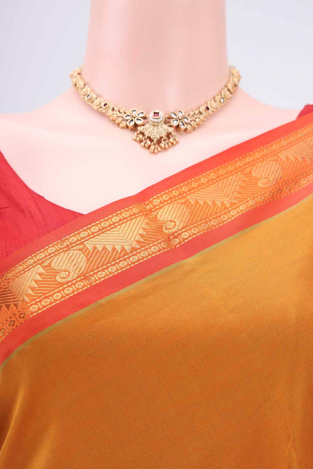 Border image of Mustard Blended Poly Cotton Saree with Plain Body and Zari Border. 