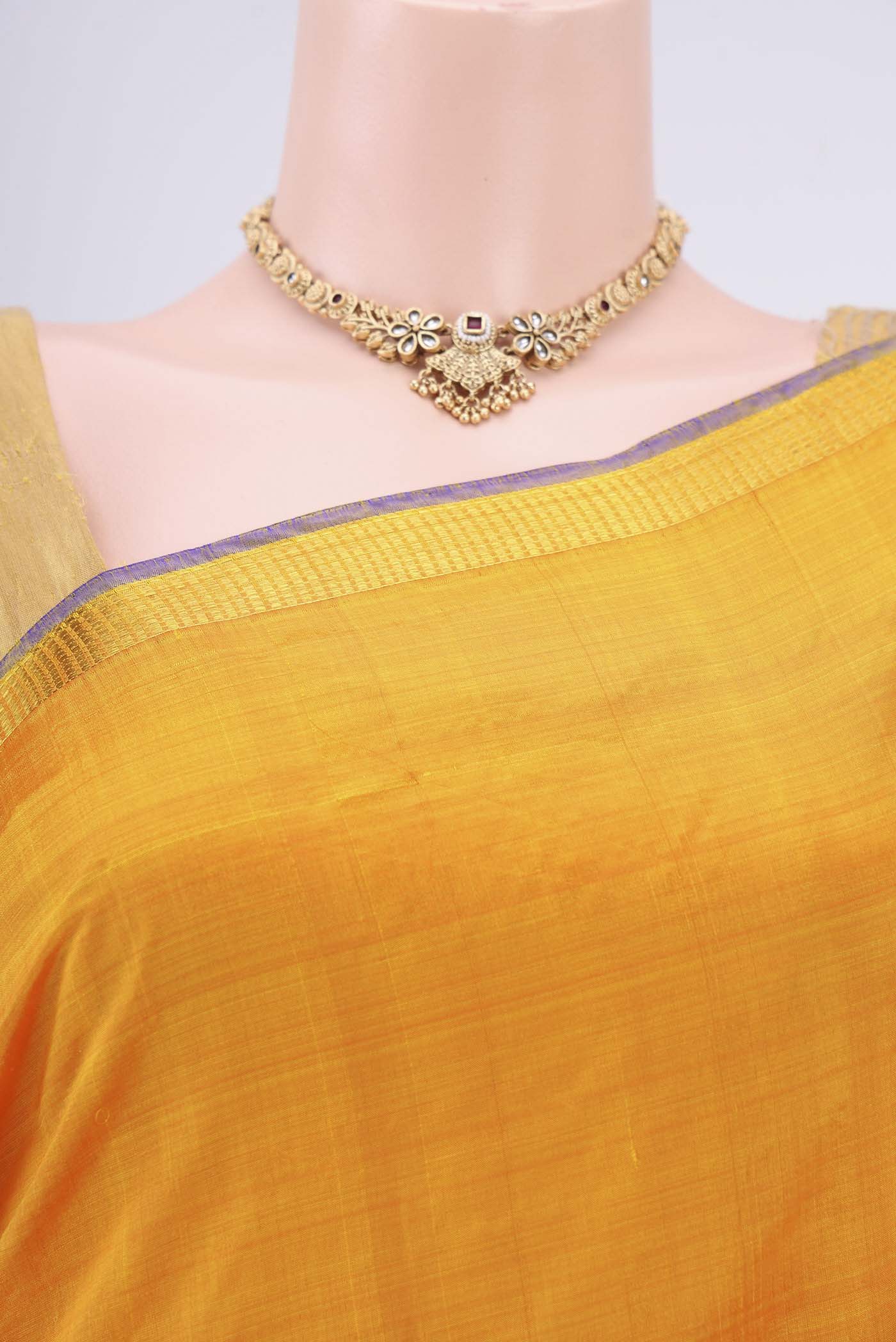 Border image of Yellow Kanchipuram Silk Saree with Plain Body and Zari Border. 