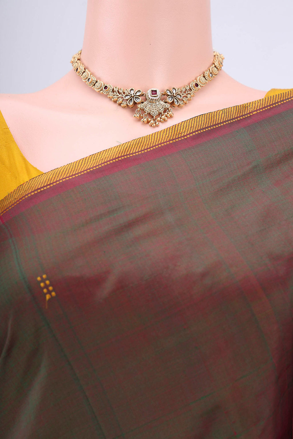 Border image of Green Kanchipuram Silk Saree with Plain Body and Thread Border. 